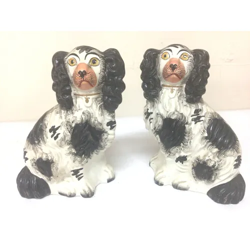 A Pair of Victorian Staffordshire black and white Span...
