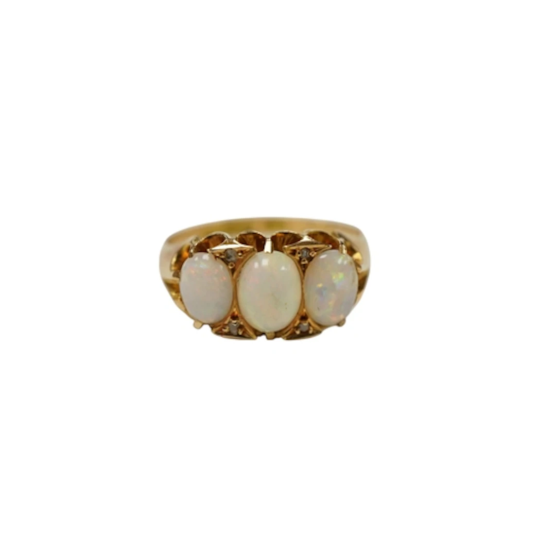 An early 20th century 18ct gold and three stone opal ring, w...