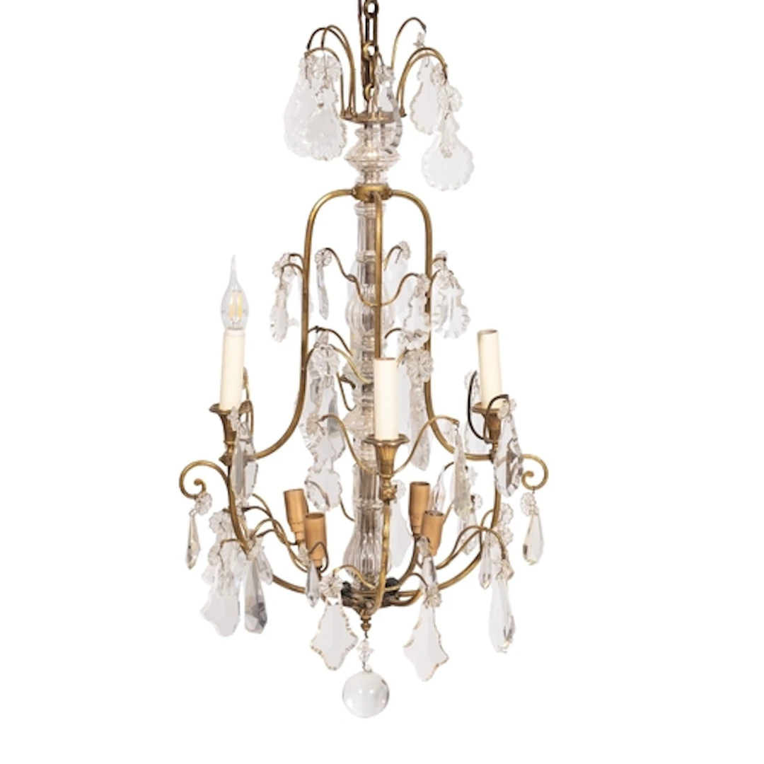 A gilt metal and glass hung eight light chandelier in Louis ...