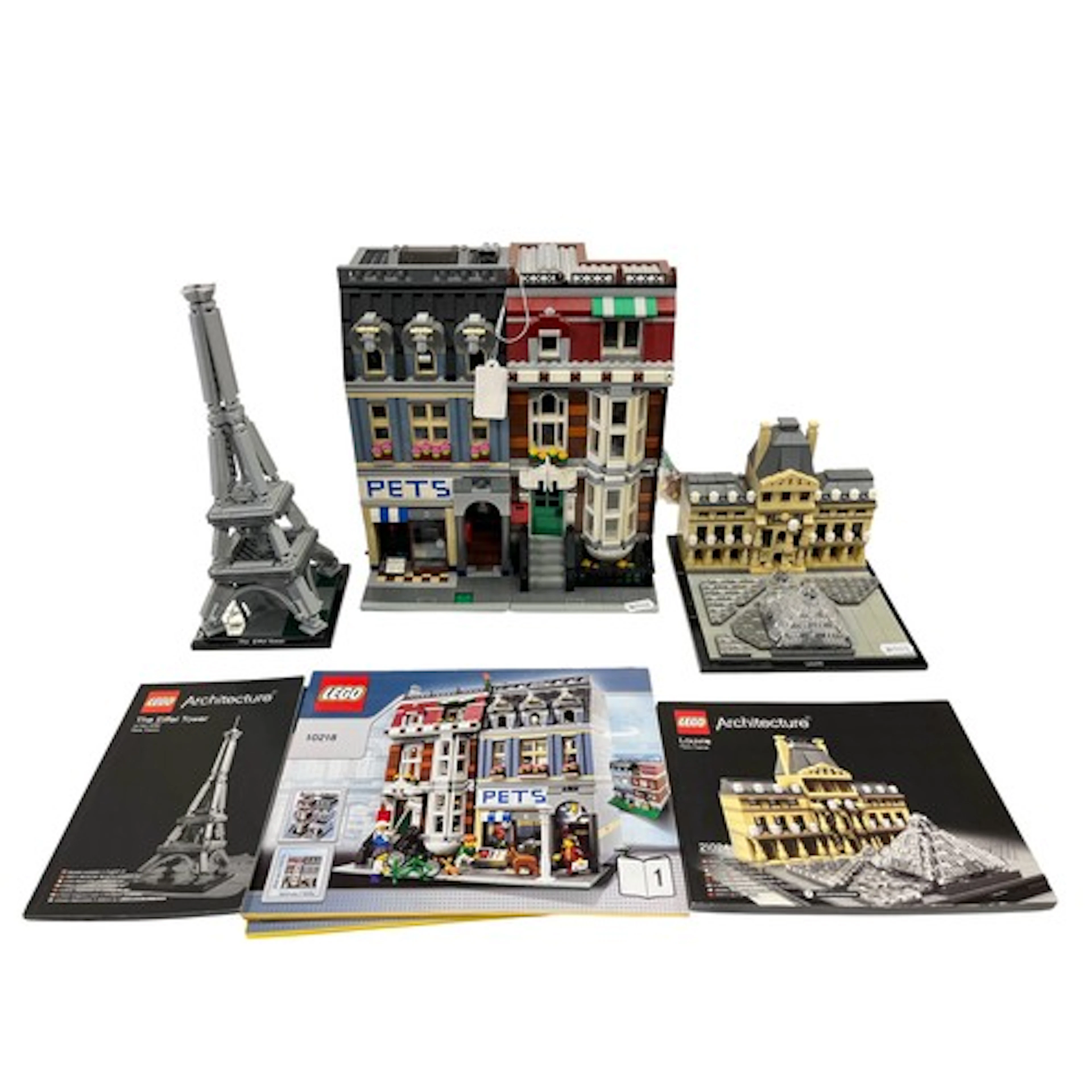 Three constructed Lego sets to include 'Pet Shop' 10218, 'Ar...