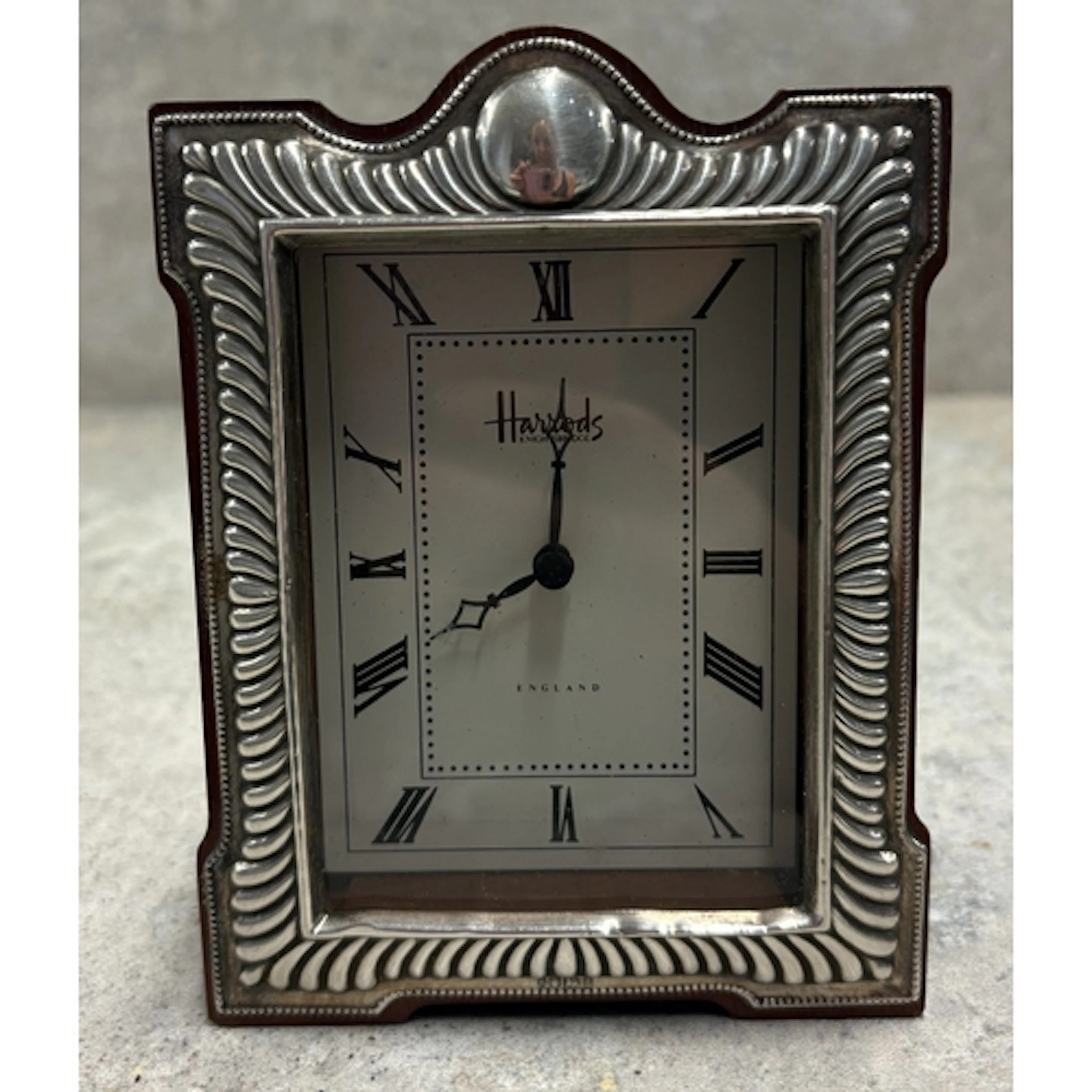 HARRODS: A silver-mounted desk clock. Approx. 270 grams of g...