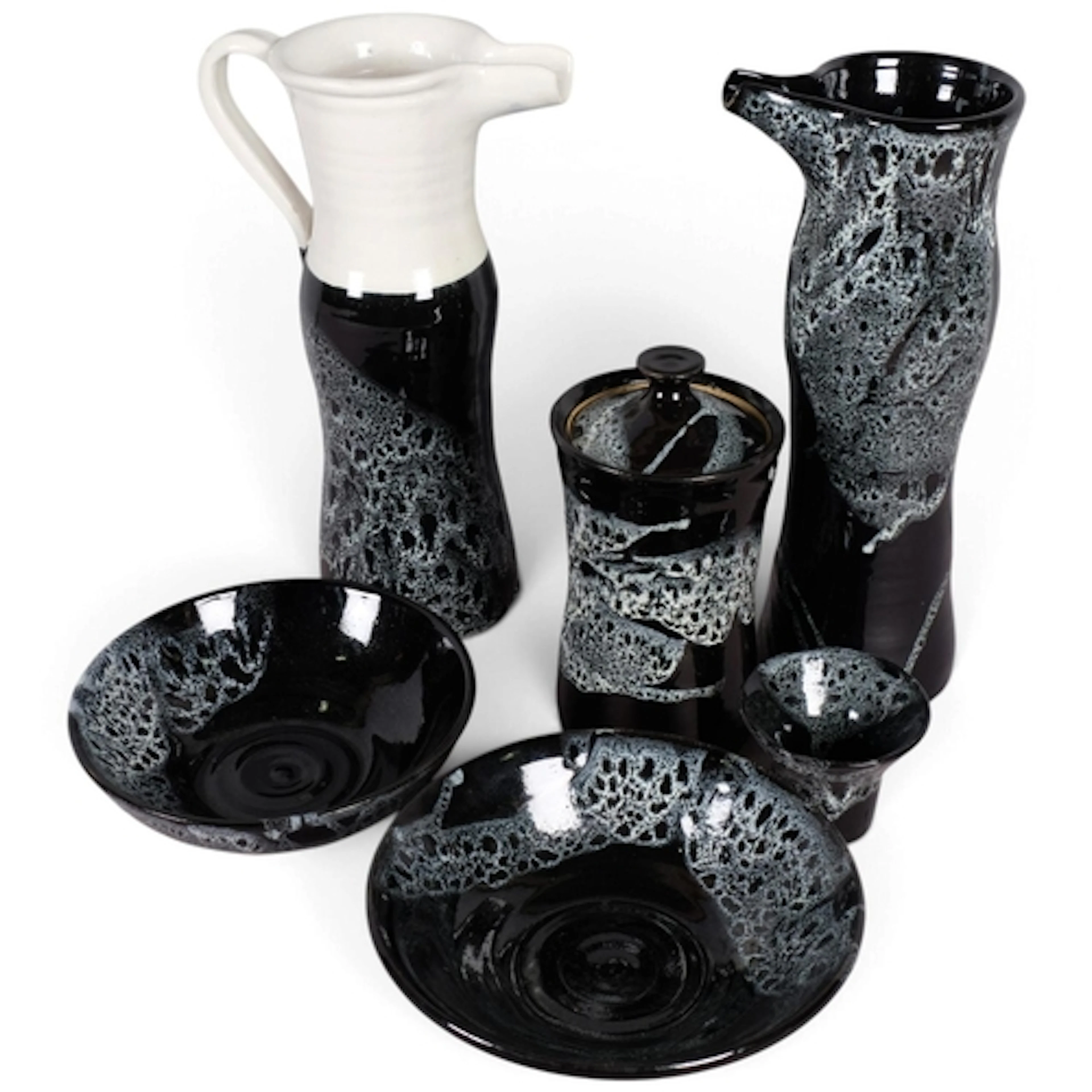 Collection of mid-century studio pottery with monochrome fat...