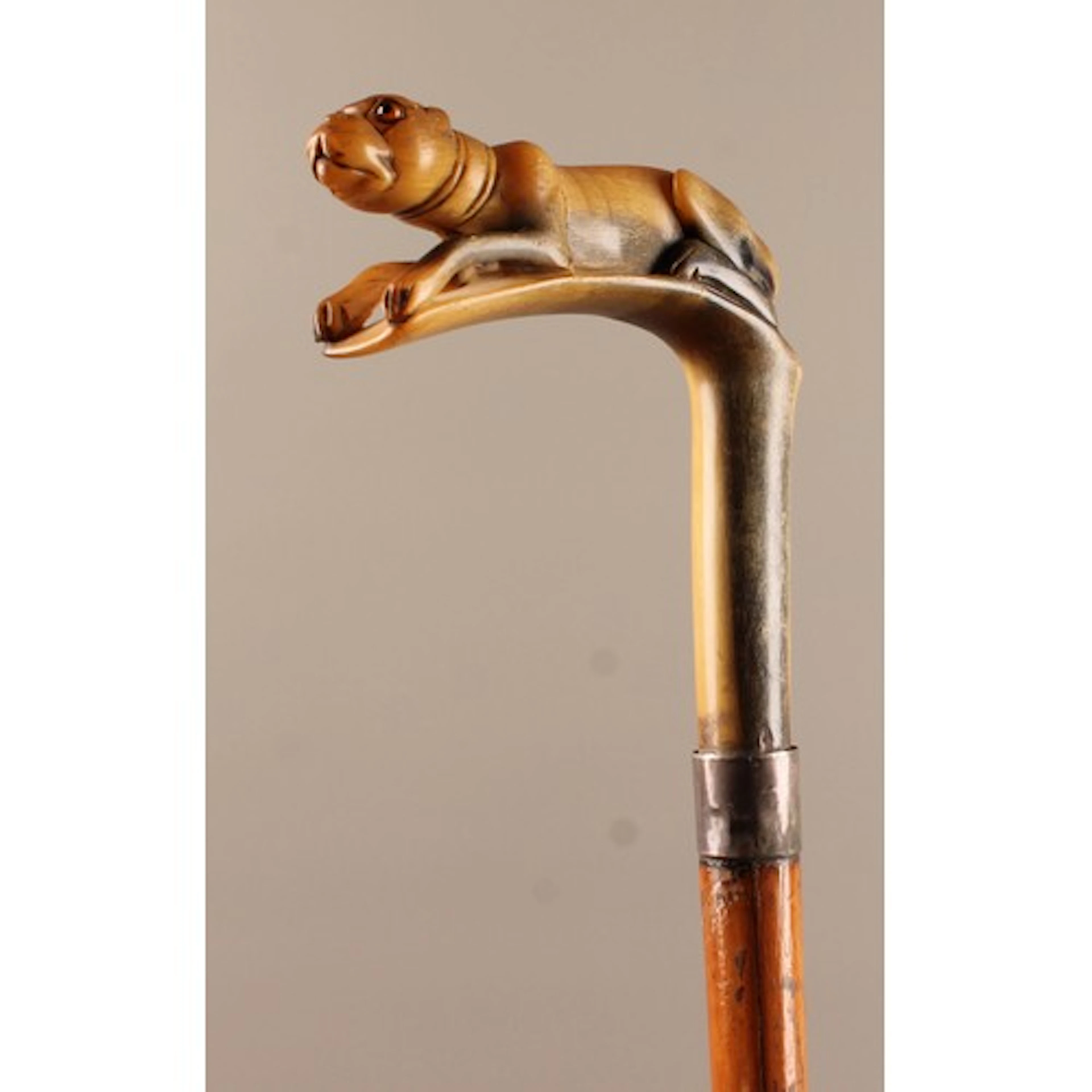 An early 20th century novelty walking stick or cane, the L-s...