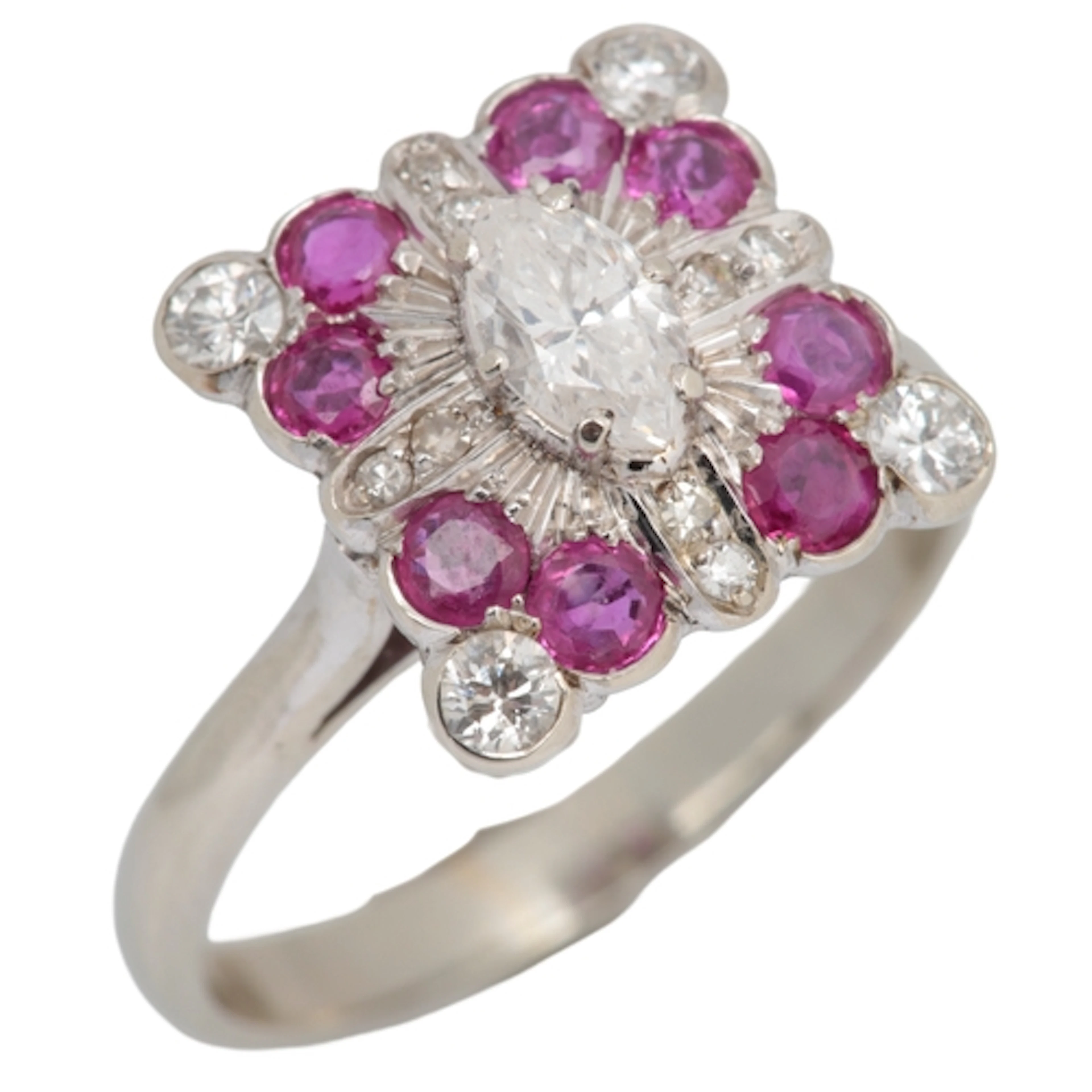 A ruby and diamond cluster ring, centring on a marquise-shap...