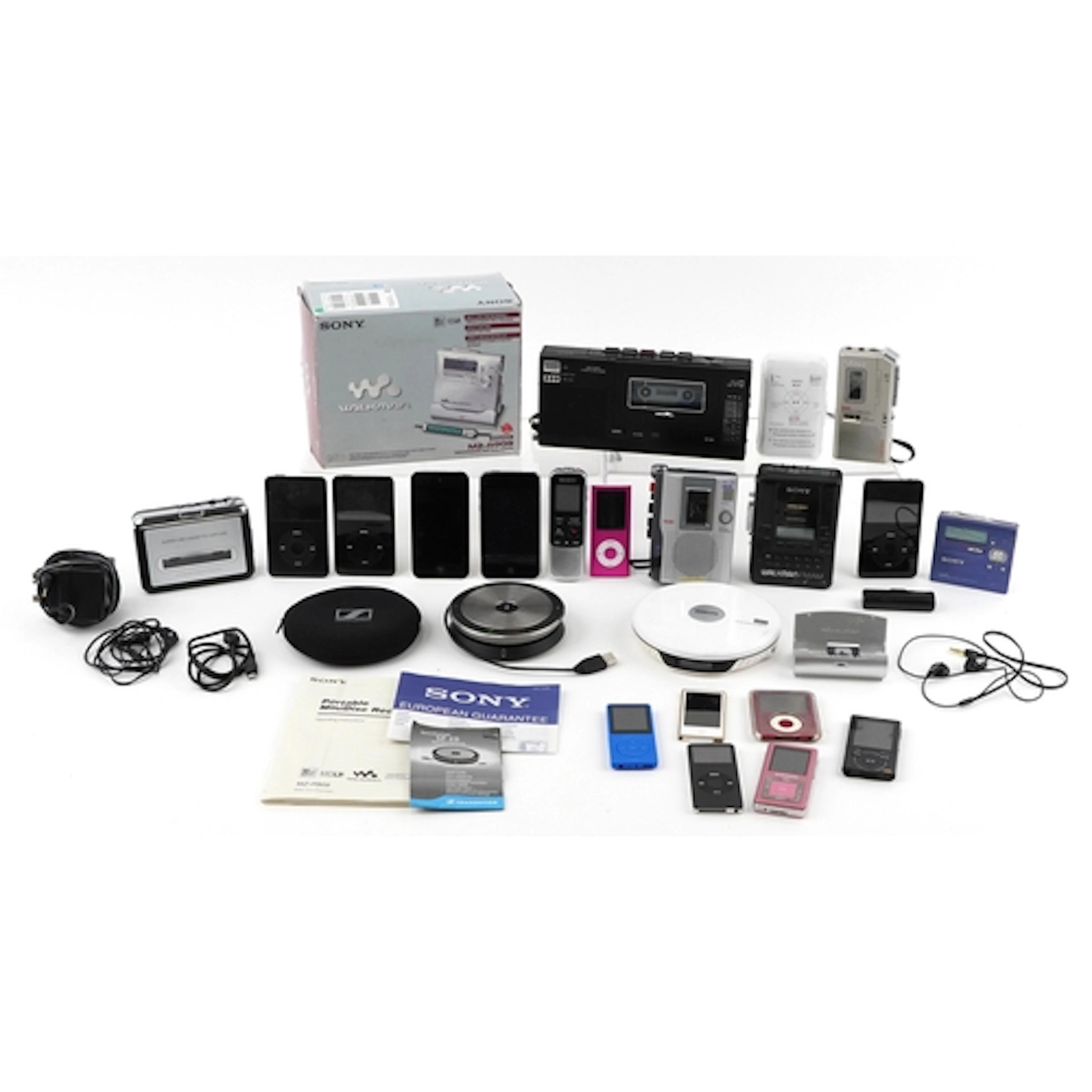 Collection of vintage and later audio devices including iPod...