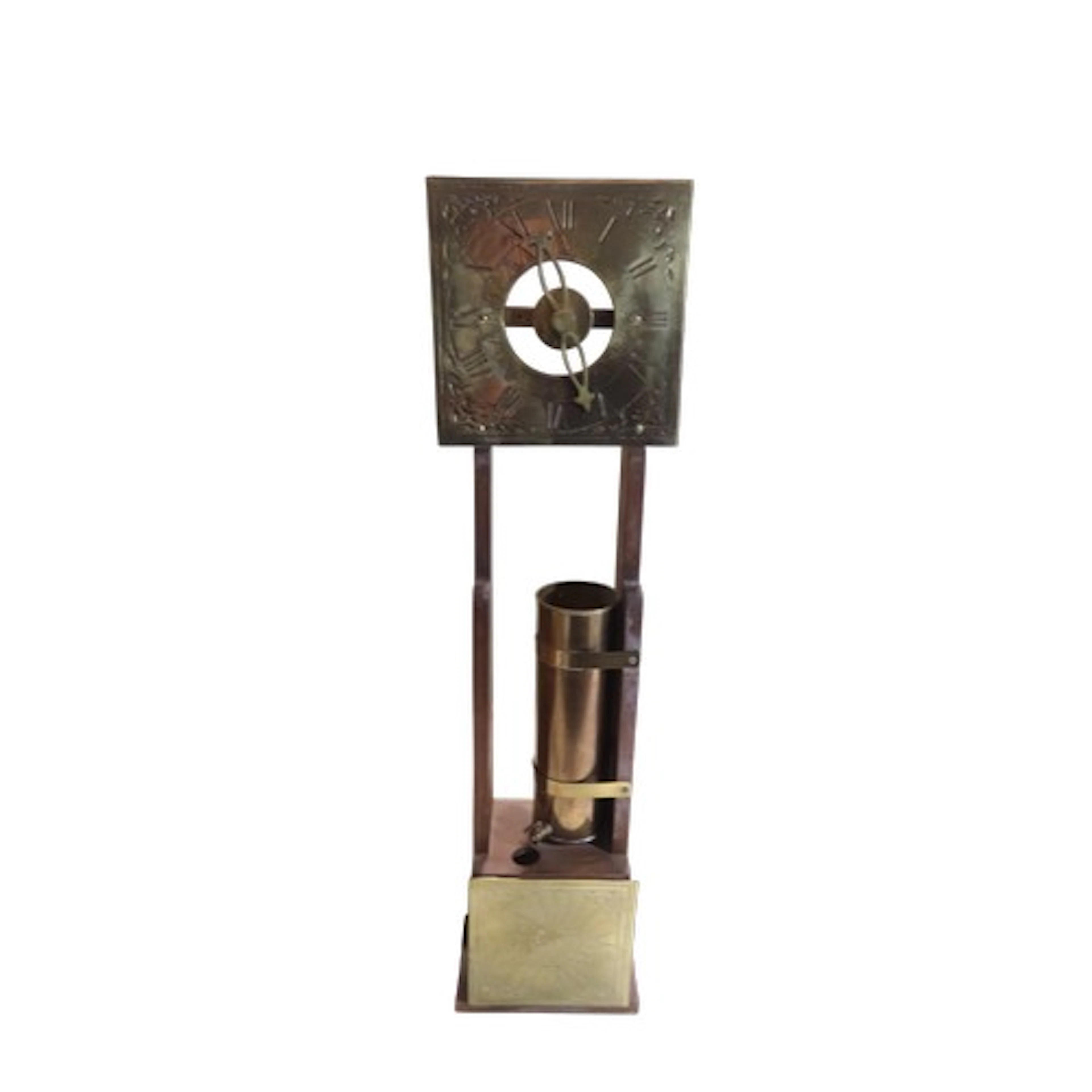 A brass and tin framed water clock, with eight inch dial