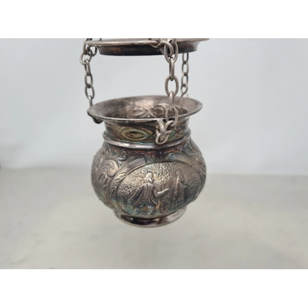 A Continental white metal hanging Pot Pourri with leafage sc...