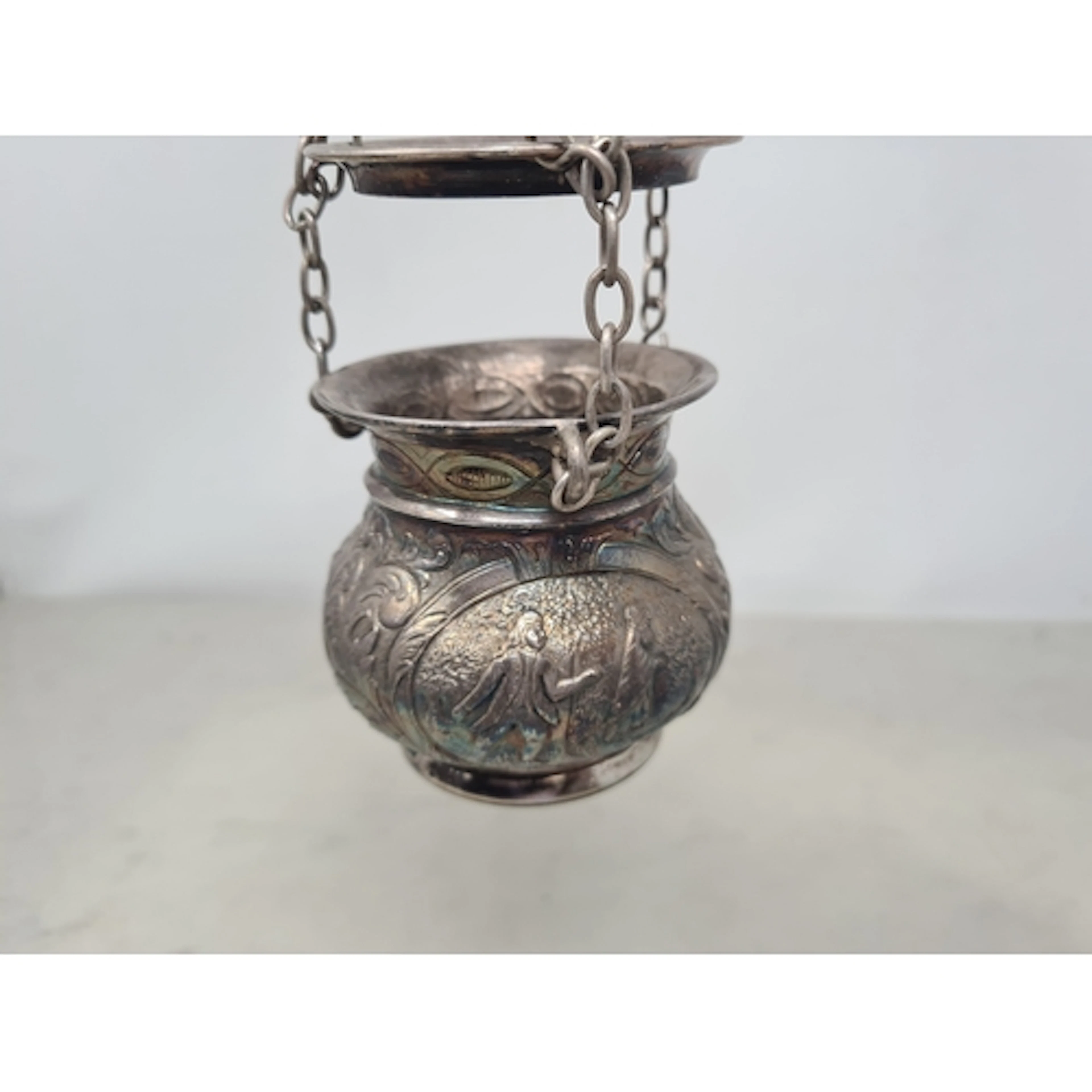 A Continental white metal hanging Pot Pourri with leafage sc...