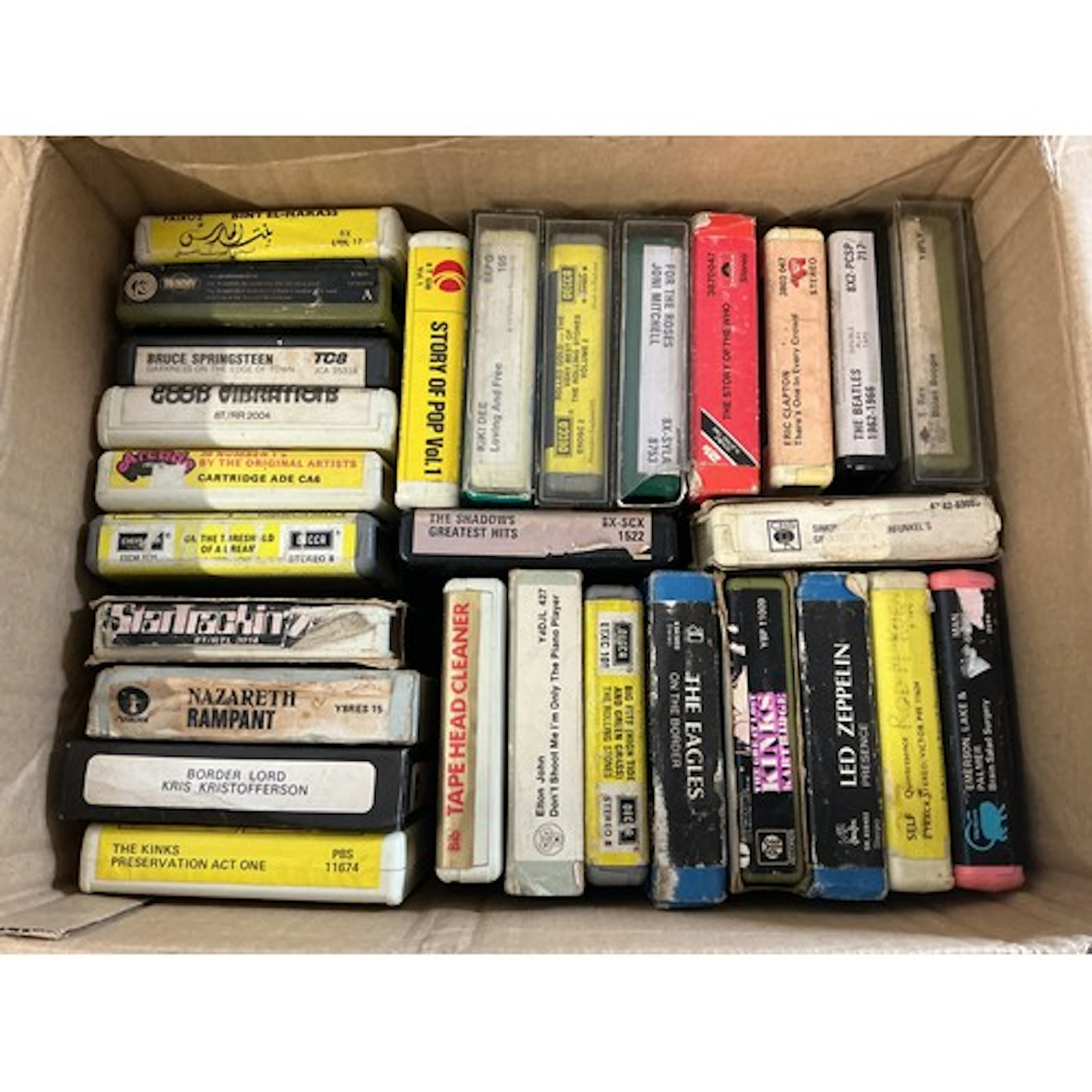 A collection of 8 track cassettes by various artists includi...