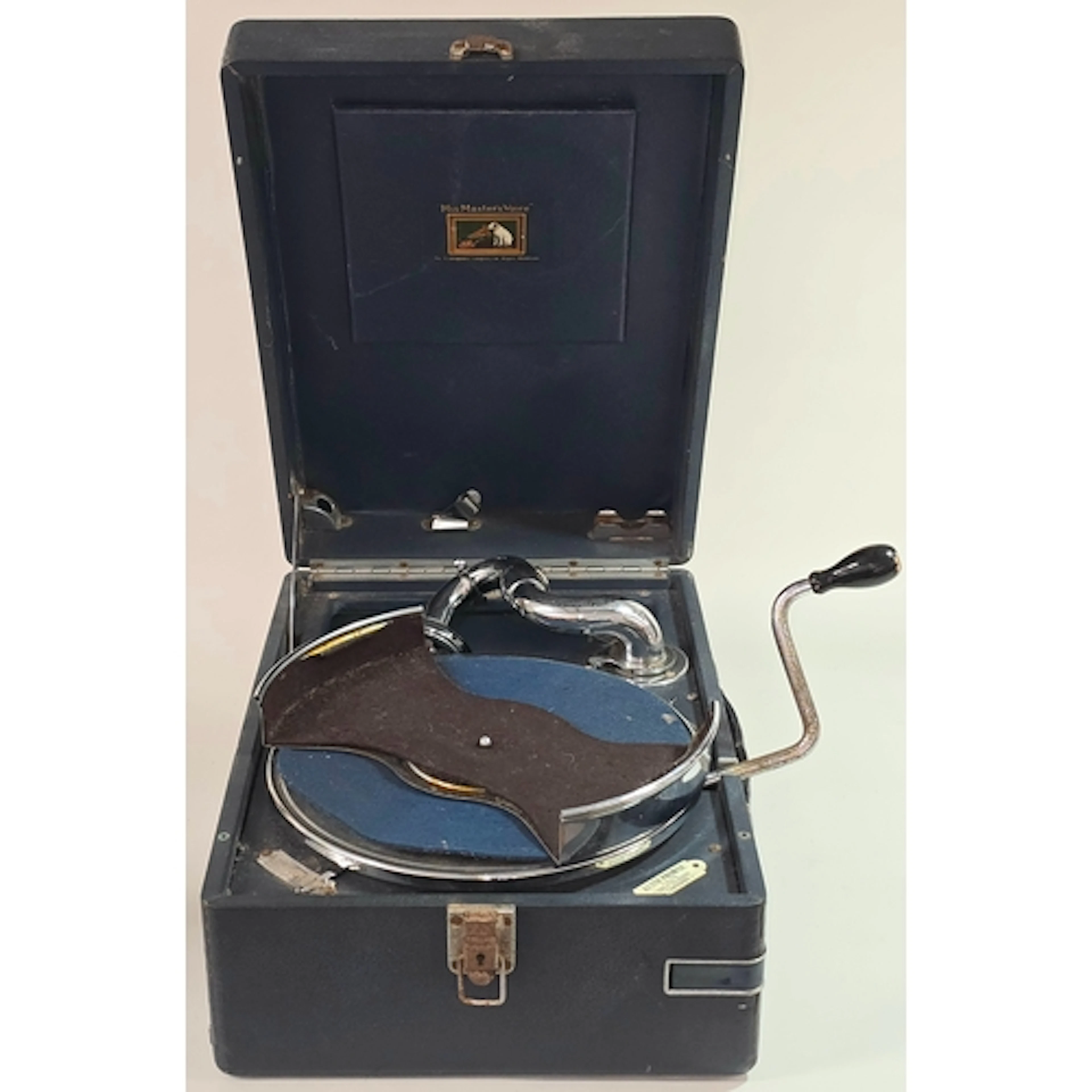 A vintage blue HMV 102 portable wind up gramophone. Partial ...