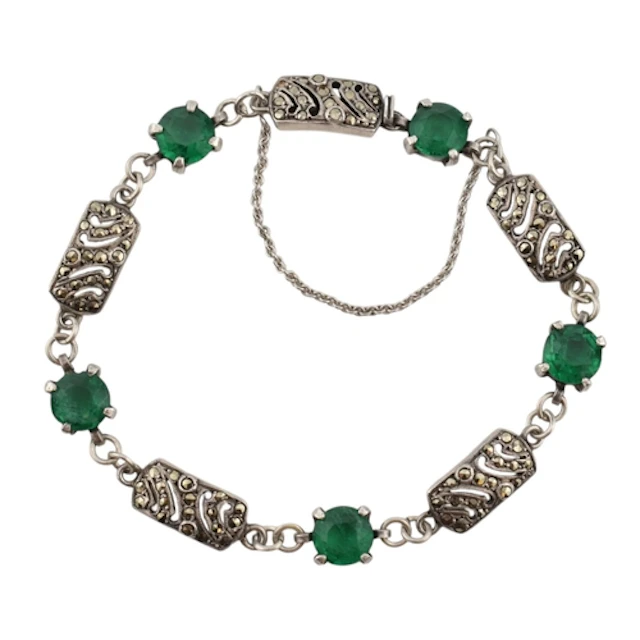 A French silver and green stone Art Deco bracelet. Alternati...