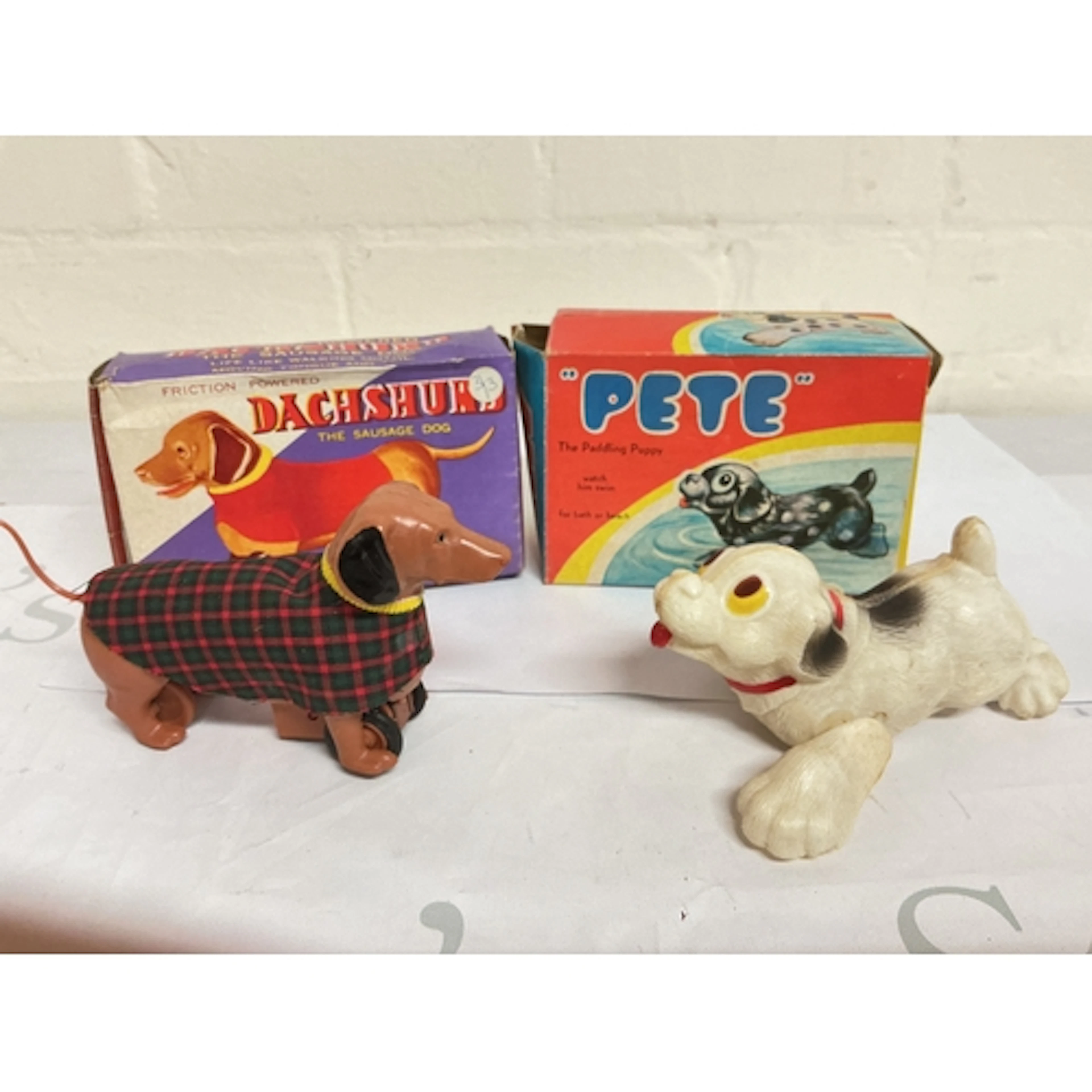 A Boxed Vintage Friction Powered, Toy Sausage Dog And ...