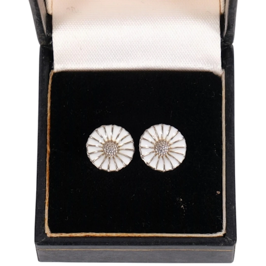 GEORG JENSEN - a pair of sterling silver and white enamel da...