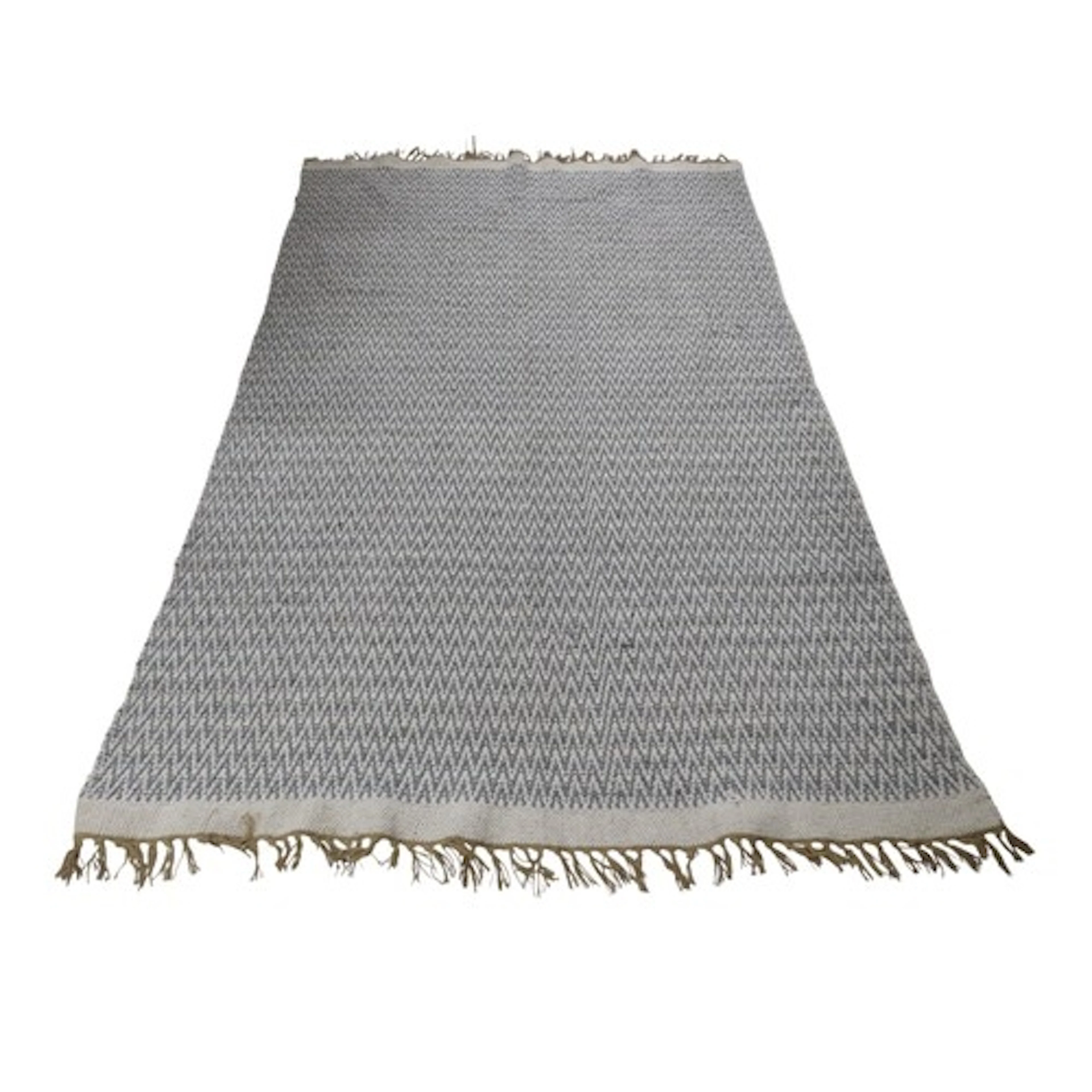 A contemporary woven carpet in alternating shades of white a...
