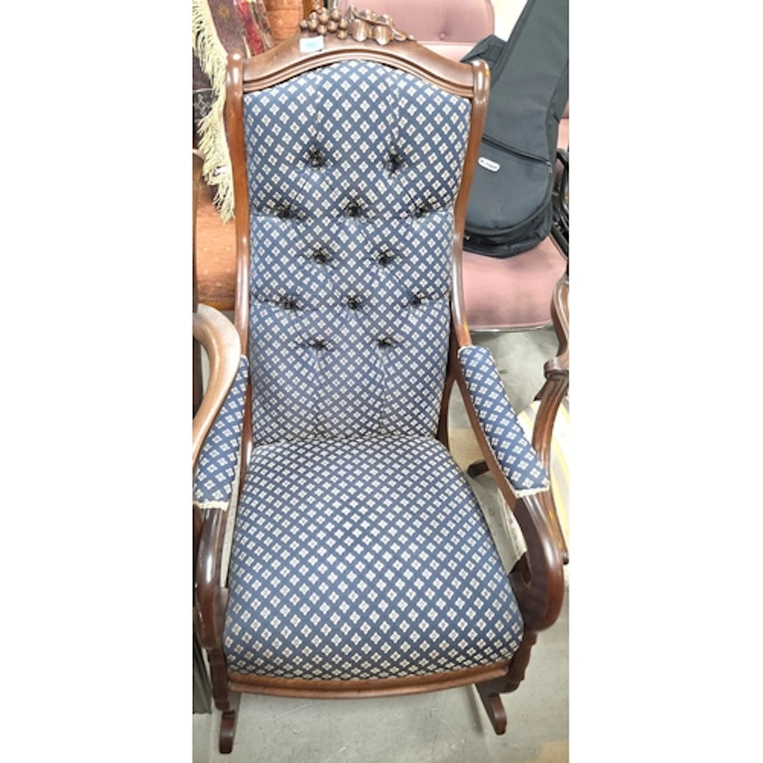 A mahogany re-upholstered button back rocking chair and a pa...