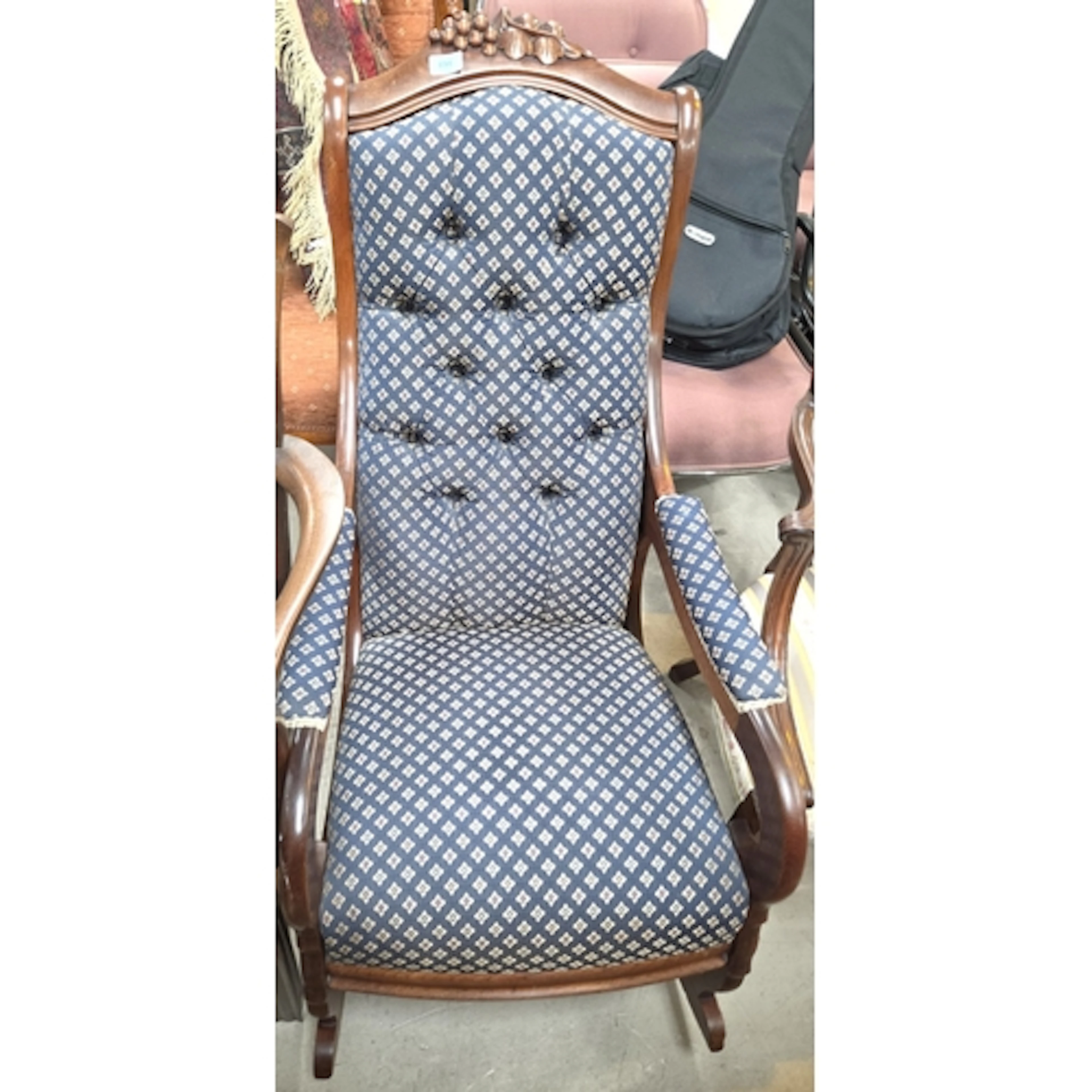 A mahogany re-upholstered button back rocking chair and a pa...