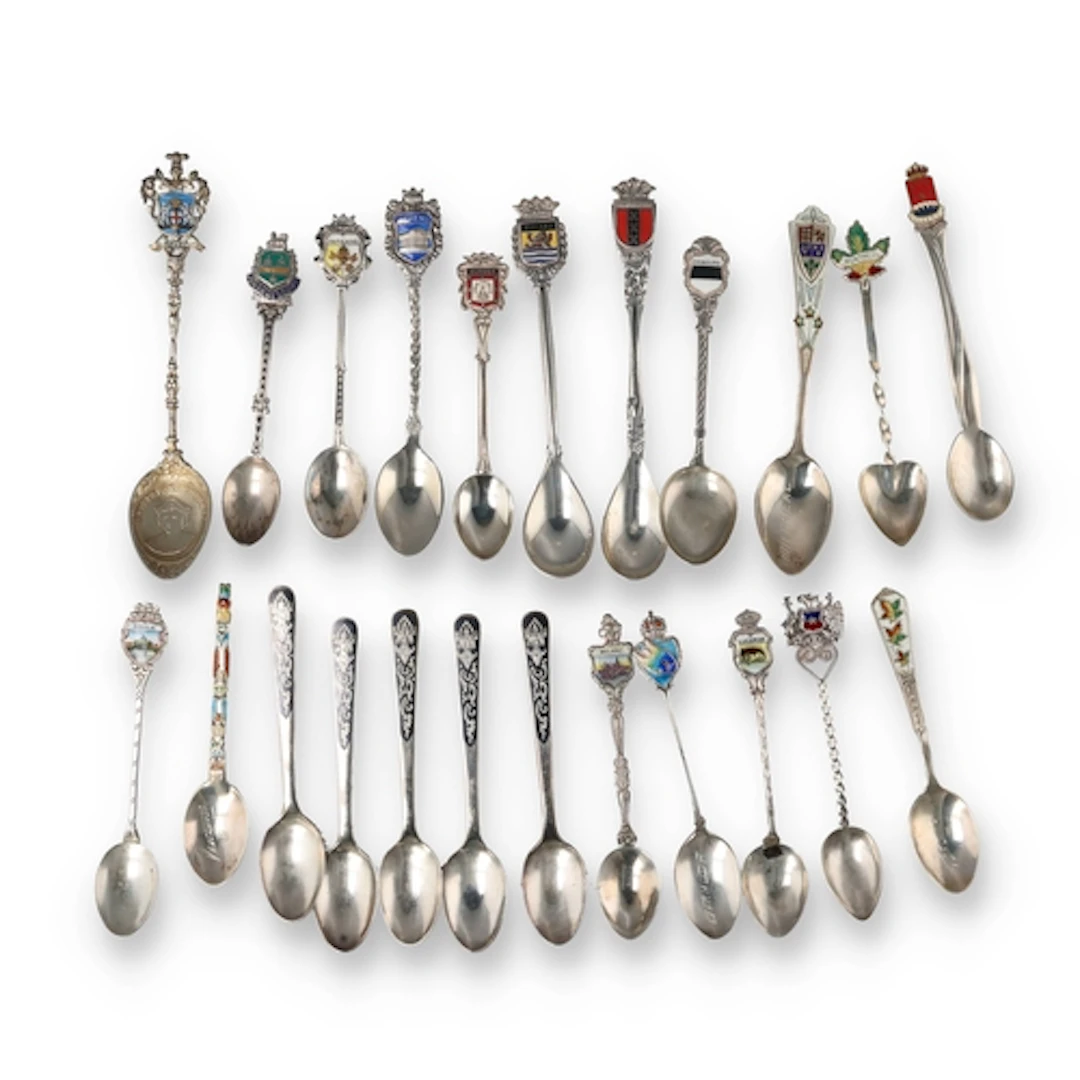 A COLLECTION OF EIGHTEEN EUROPEAN AND WORLD SILVER AND ENAME...