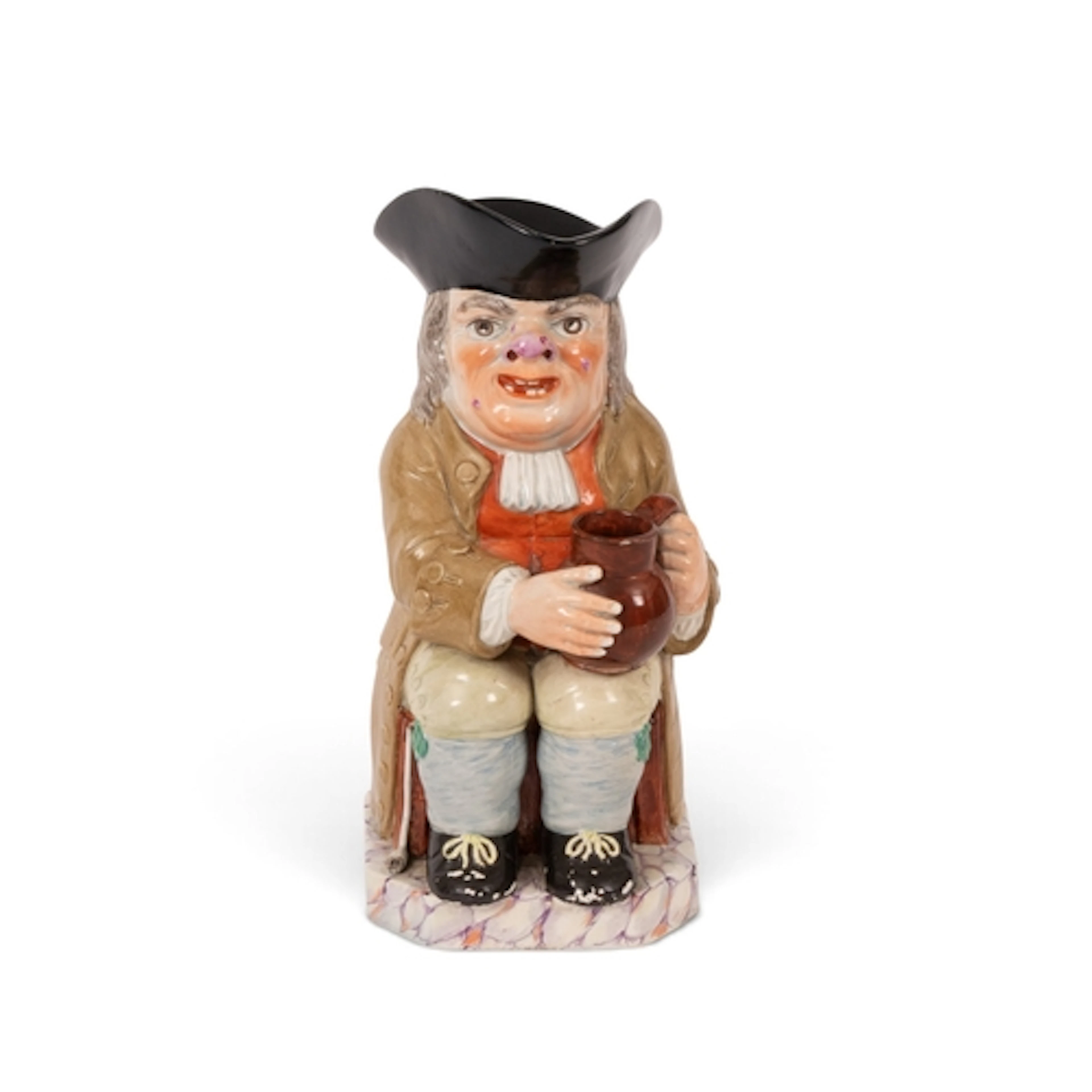 A Neale & Co creamware Toby jug, c.1795, seated with an ...