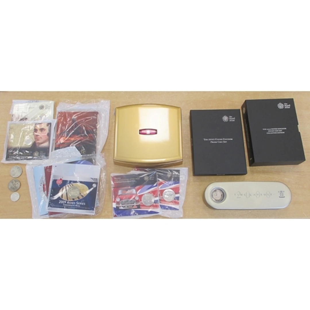 Collection includes Royal Mint boxed proof FDC sets, include...