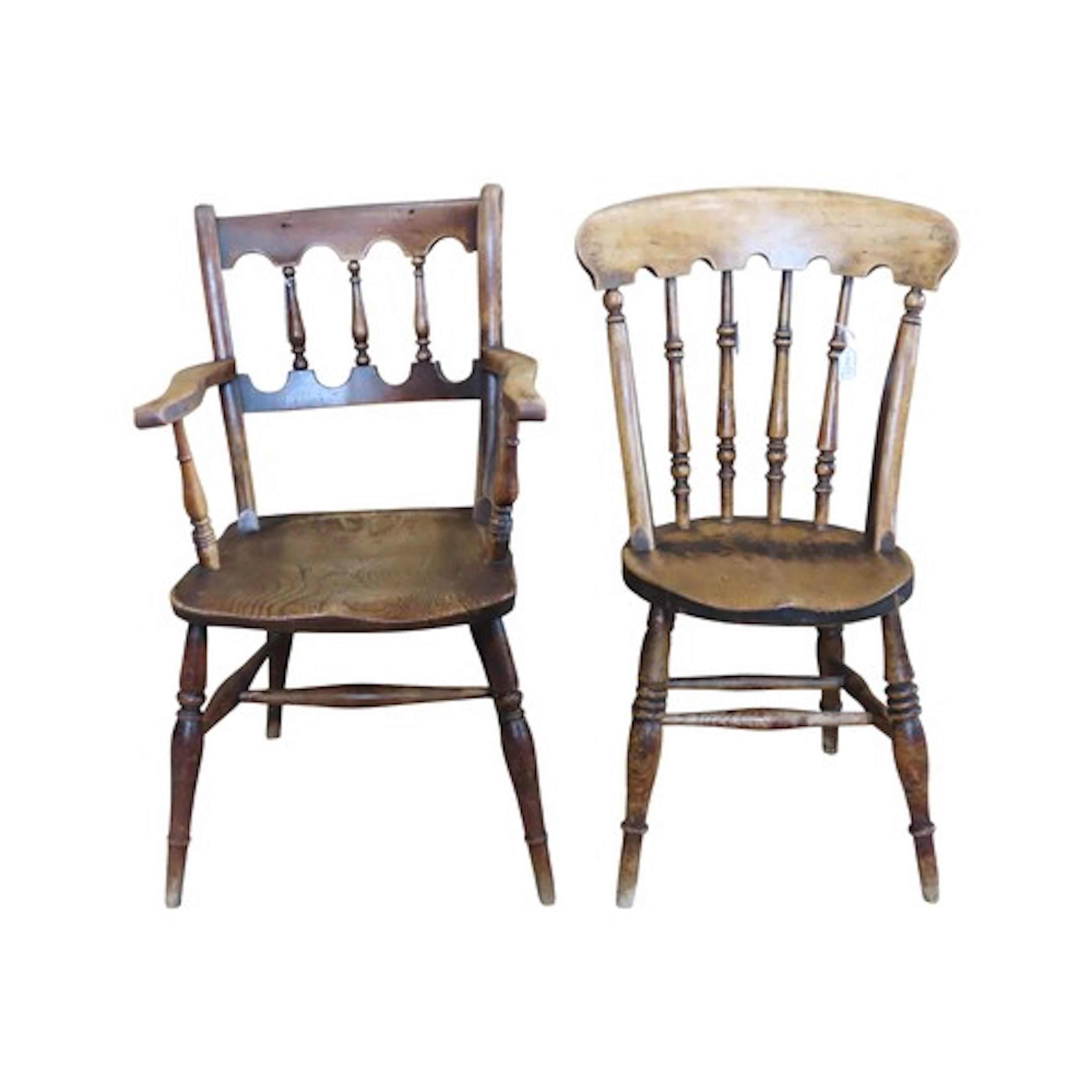 An old windsor type kitchen chair with turned spindle back a...