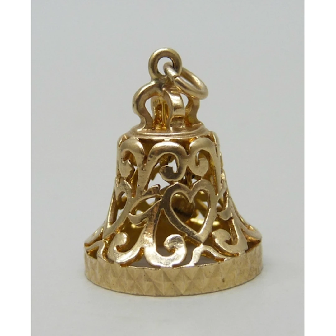 A 9ct gold charm in the form of a bell, 3.8g, 2.5cm includin...