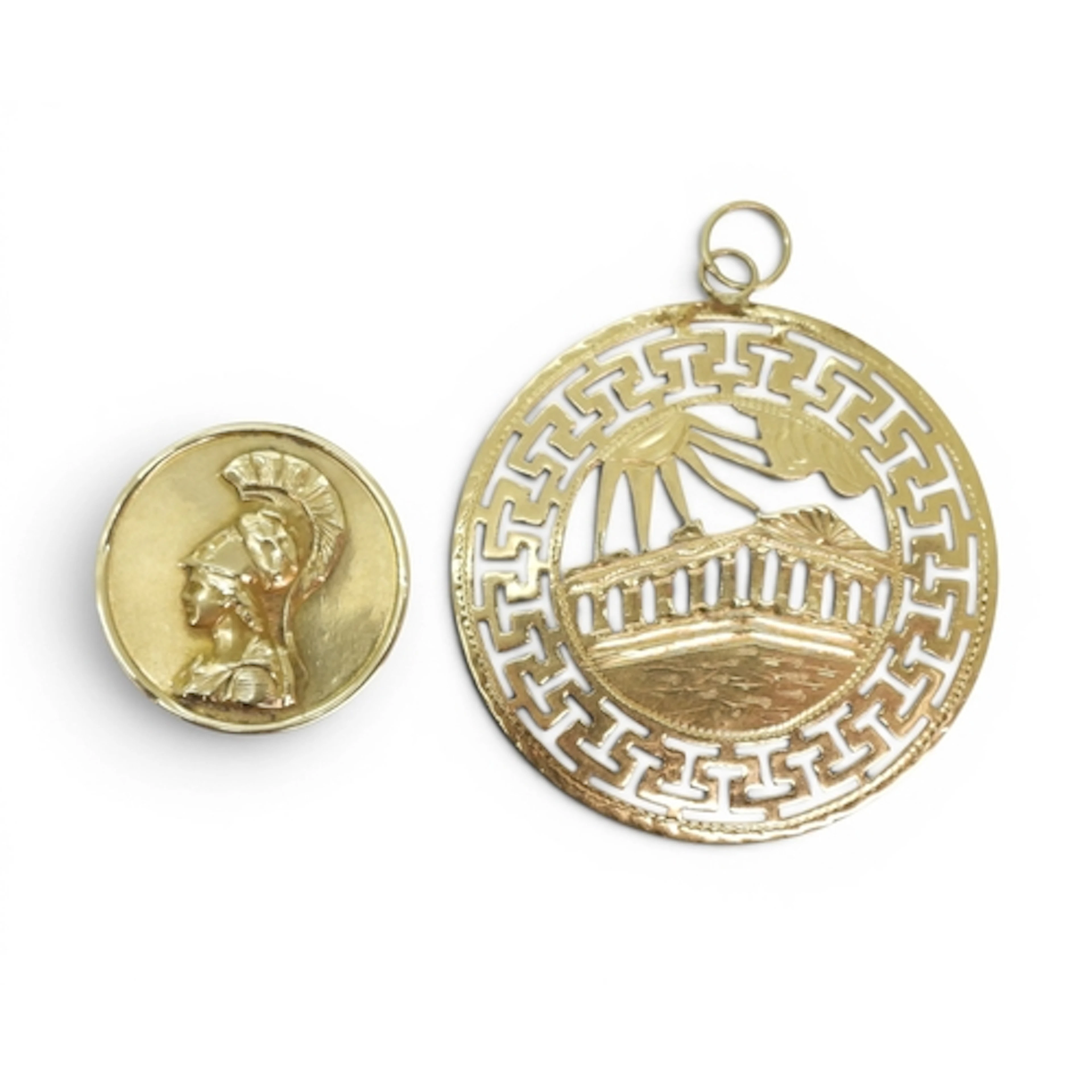 An 18k gold Parthenon pendant weight 3.2gms, and a 14k gladi...