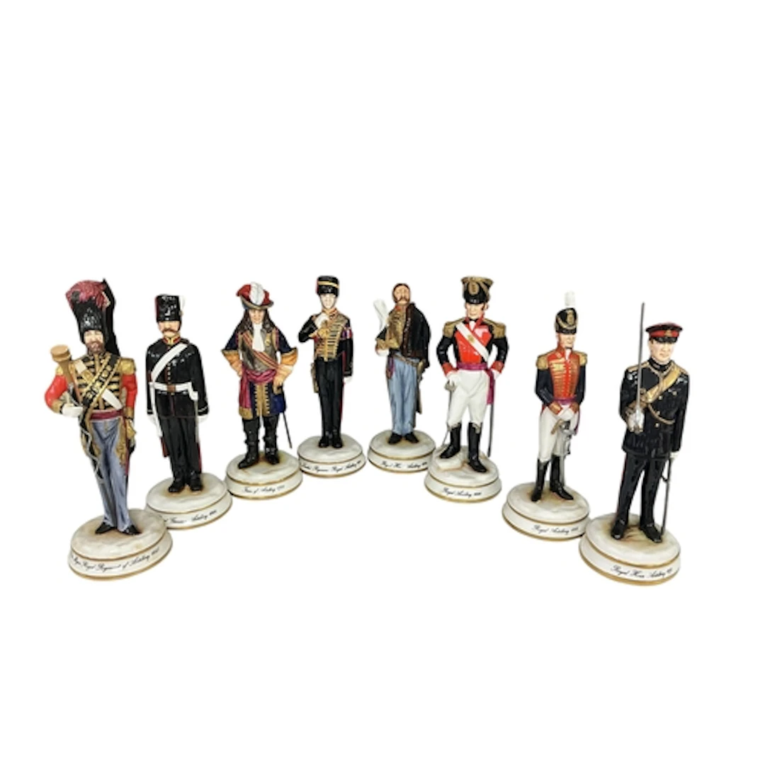 A collection of eight Michael Sutty limited edition porcelai...