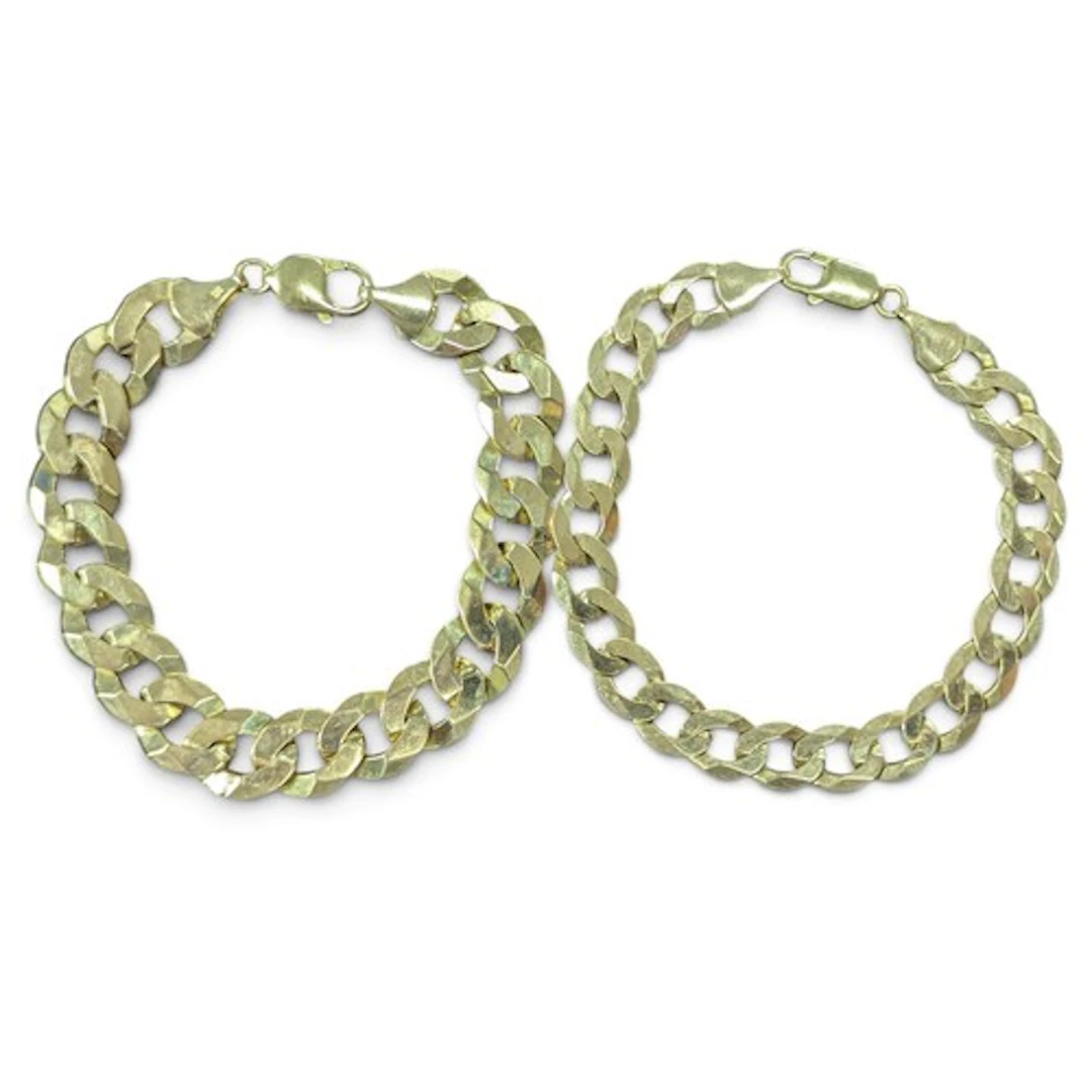 A graduated near pair of 9ct gold curb link bracelets, 21.5c...