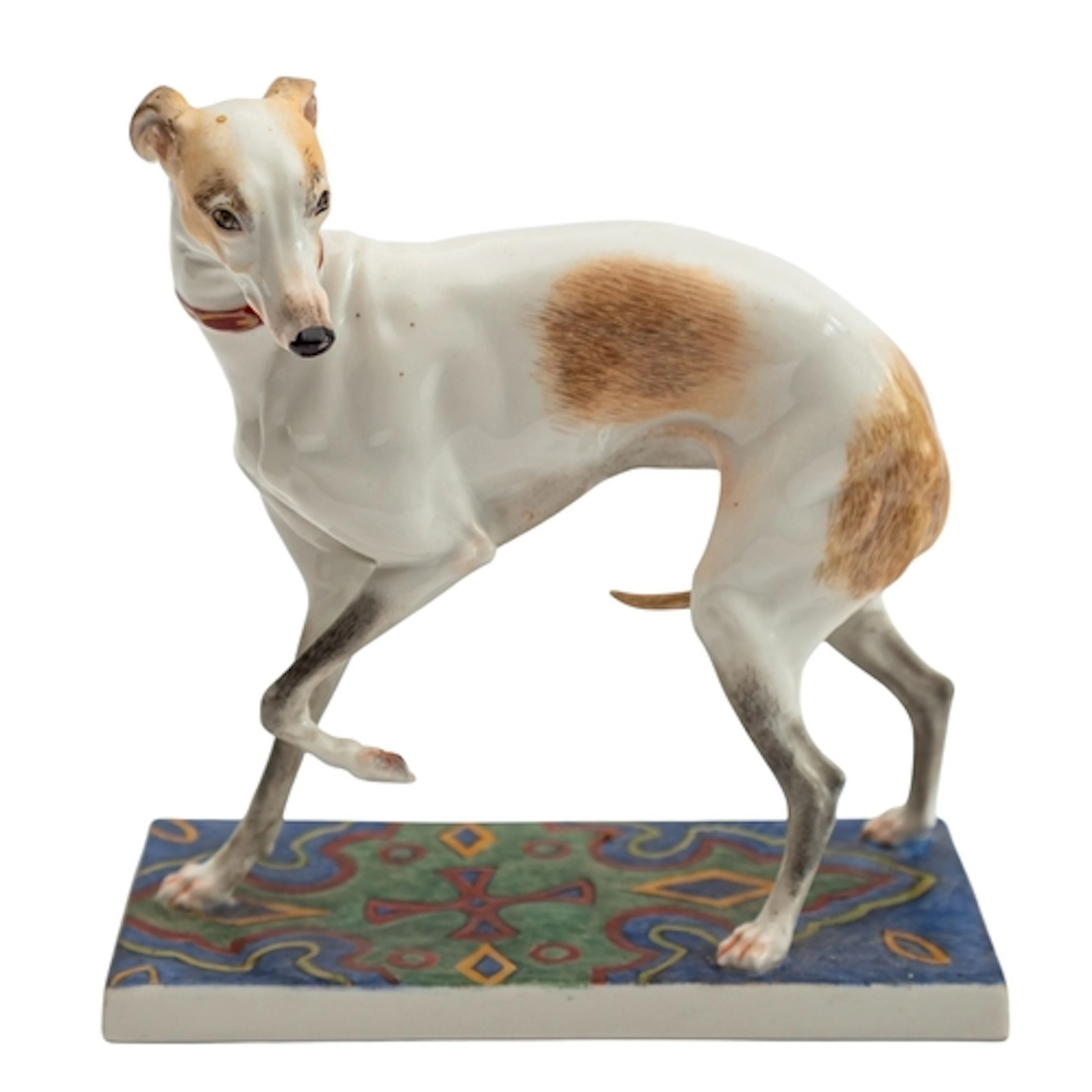 A Nymphenburg porcelain figure of a greyhound modelled after...