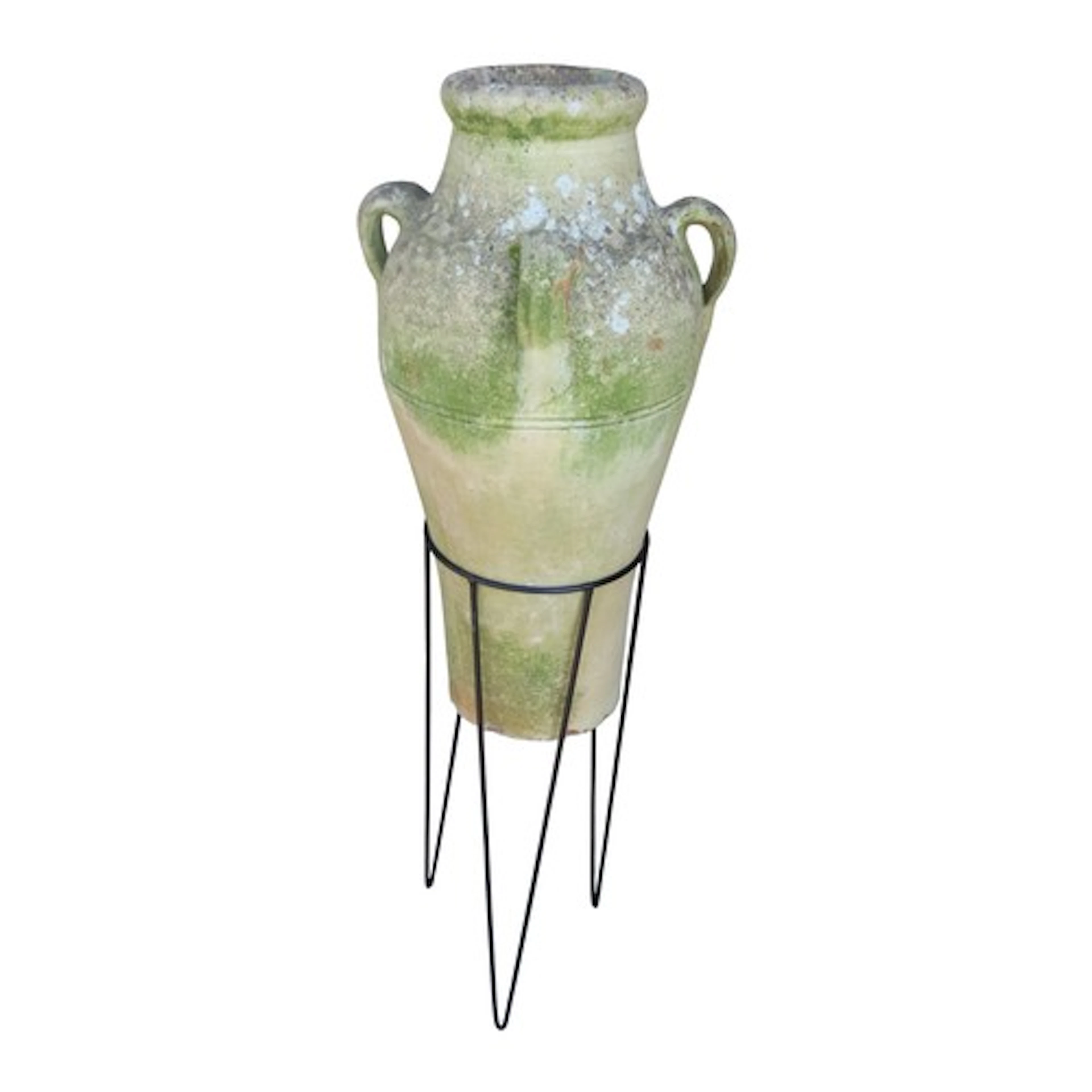 A weathered buff coloured terracotta Mediterranean four hand...