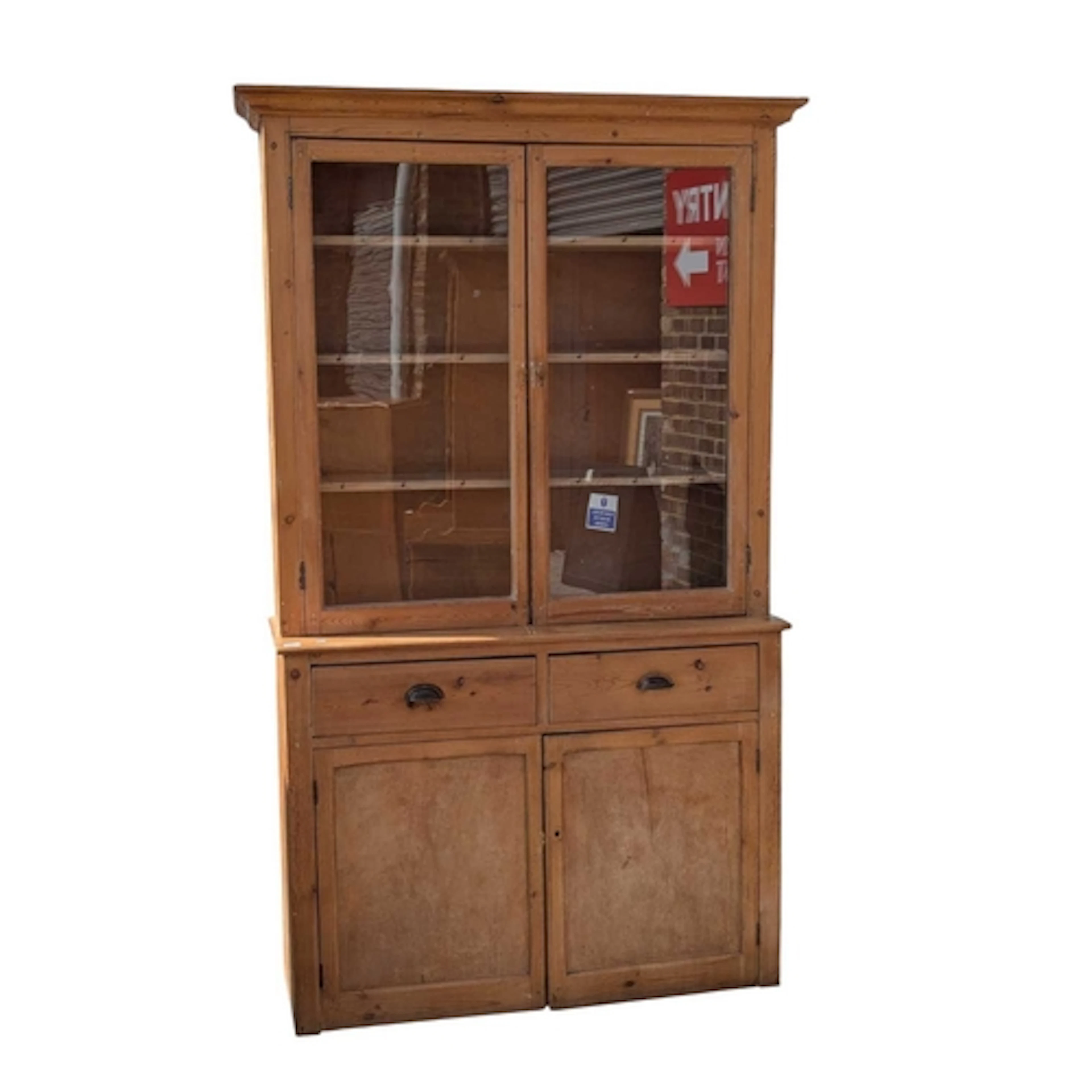 A 19th century Victorian country pine dresser. The glass boo...