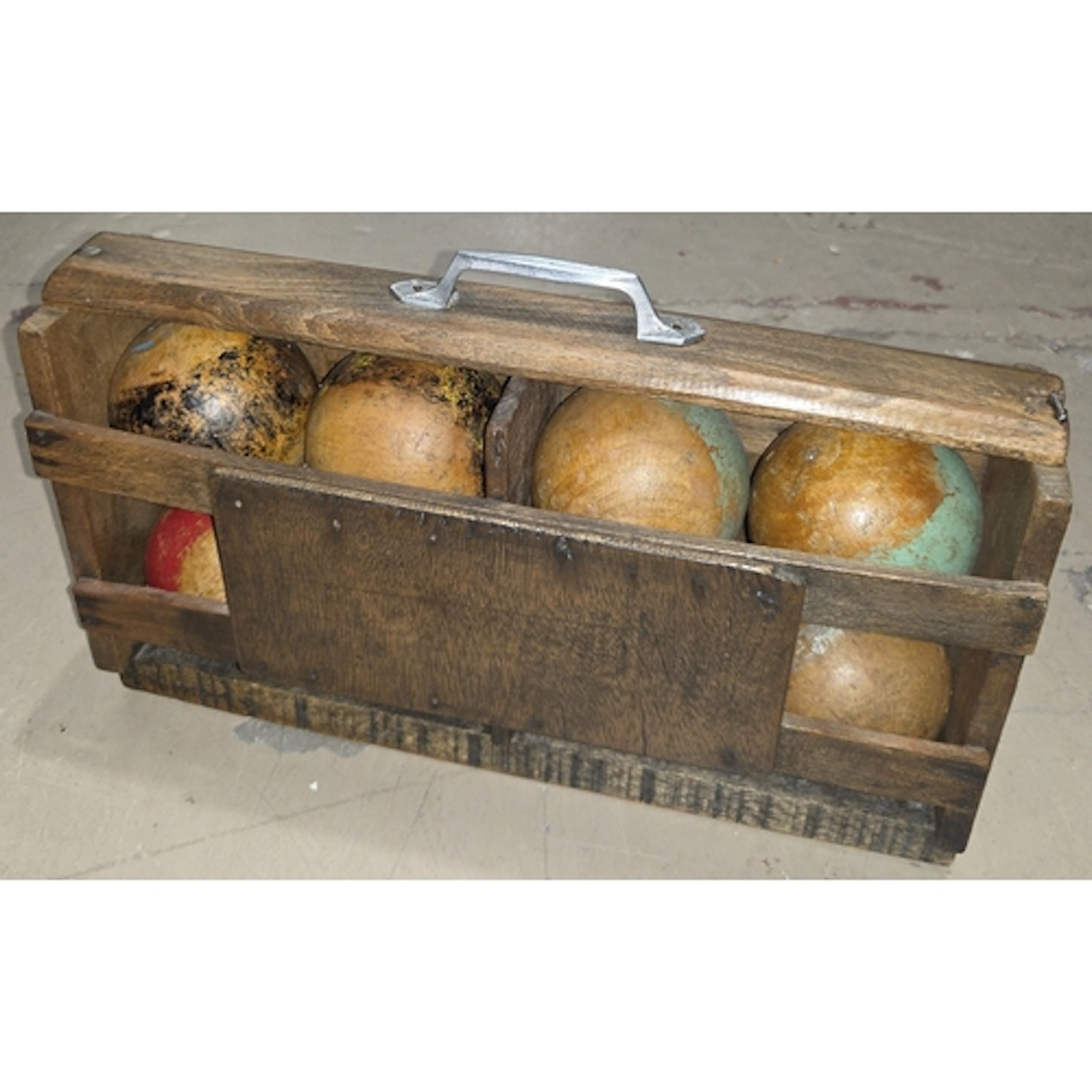 A set of vintage French boules in a case.