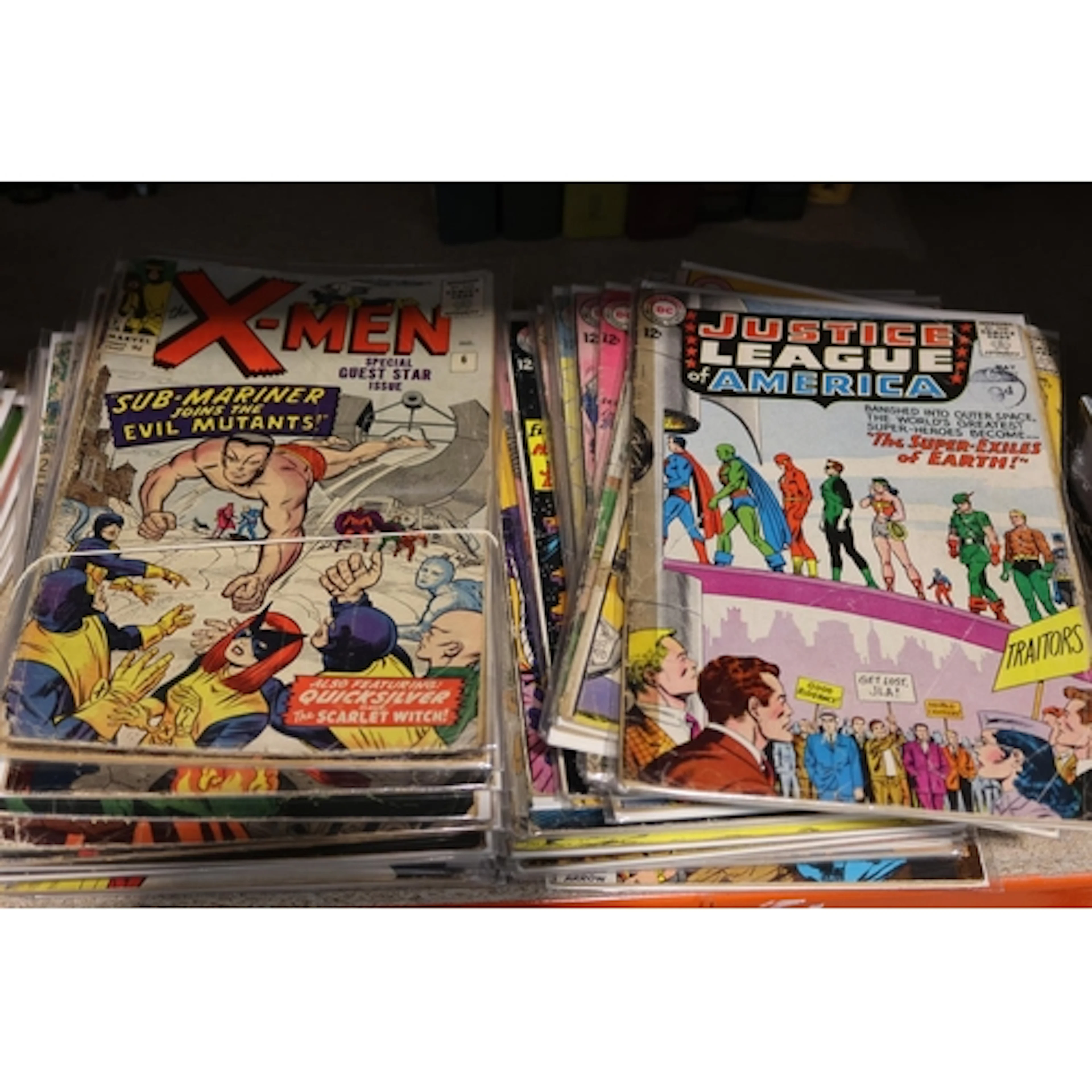 Vintage X Men and Justice League comics.