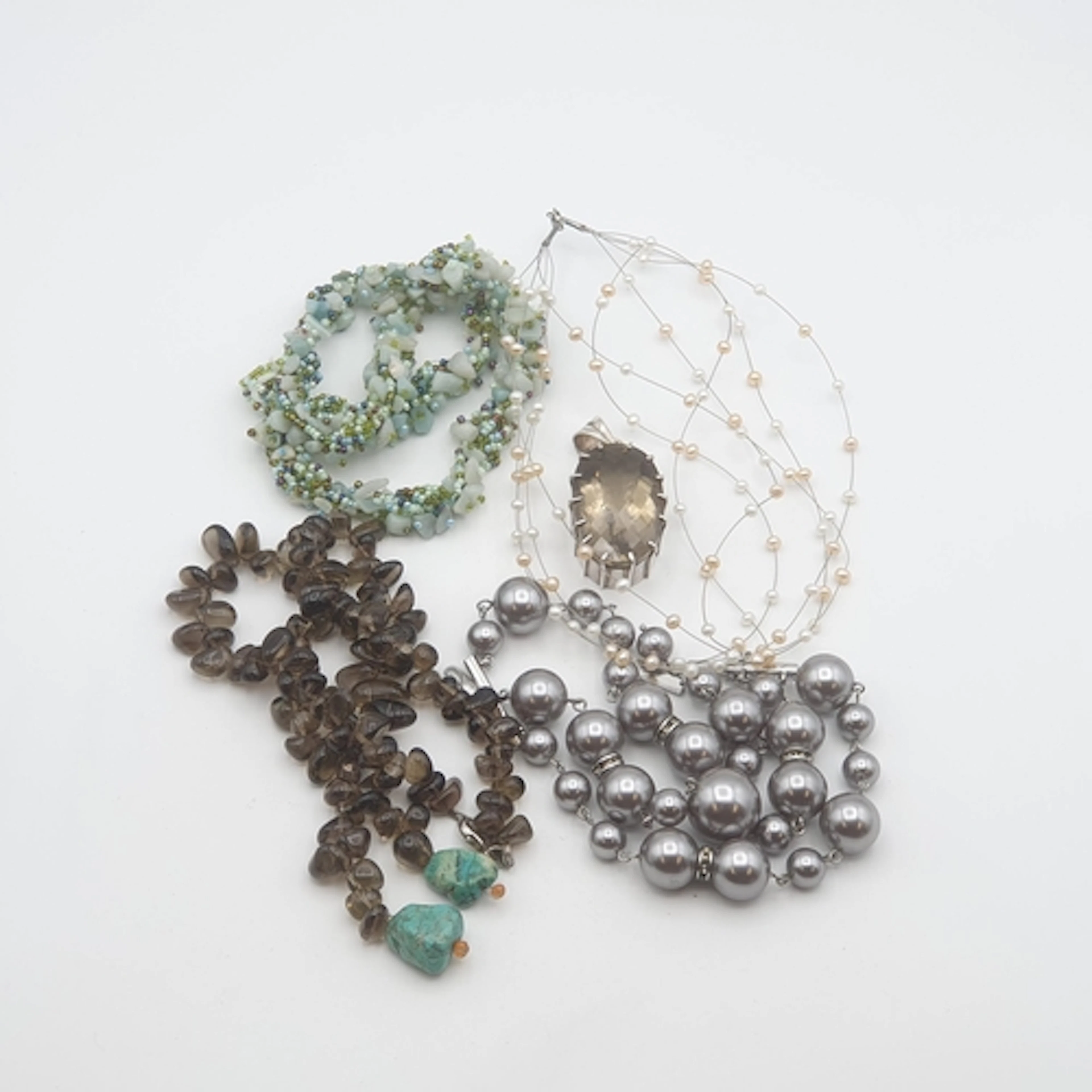 A citrine Necklace with turquoise finial drops by Pickett, a...