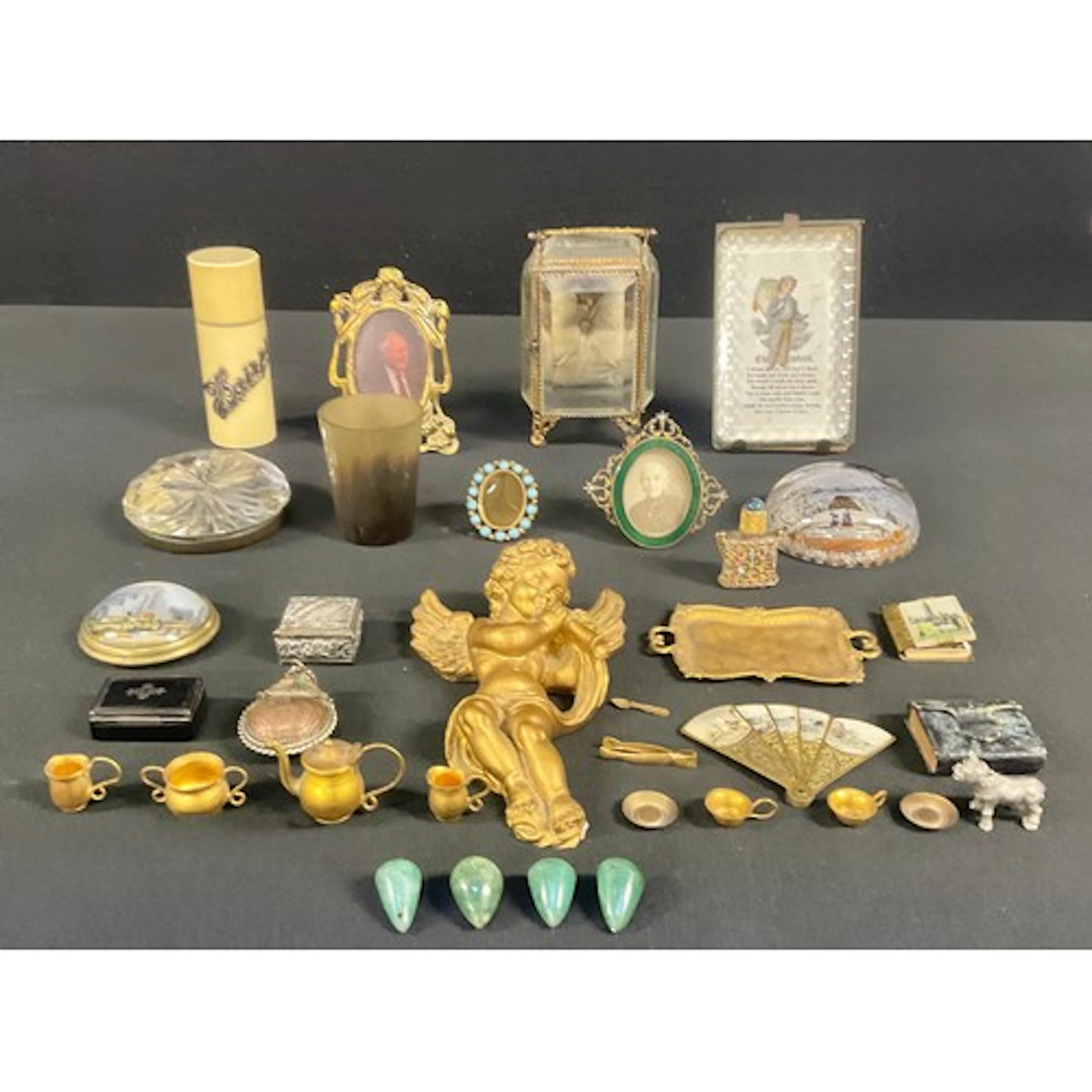 An early 20th century git metal and glass pocket watch case,...