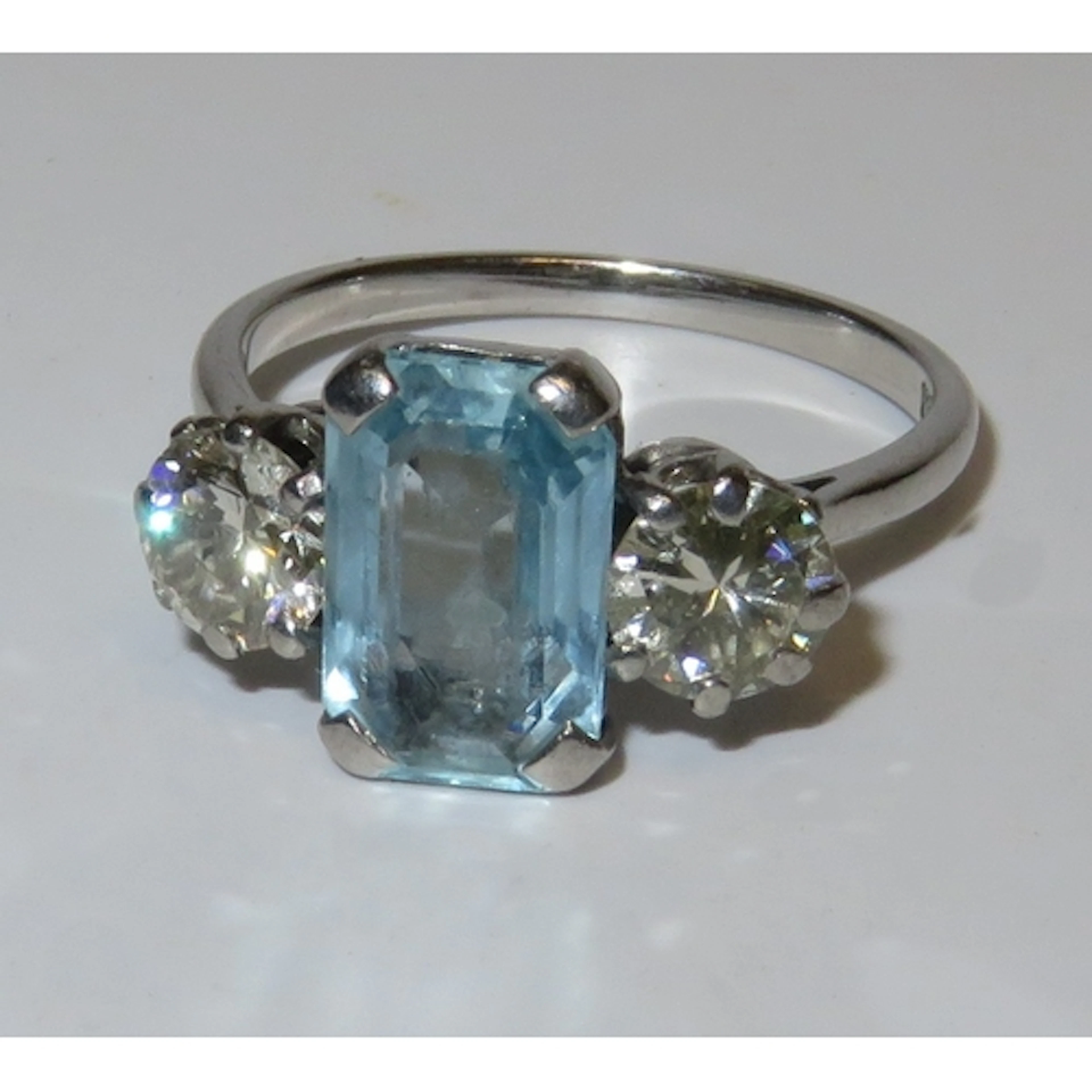 18ct White gold three stone ring set with two brilliant cut ...