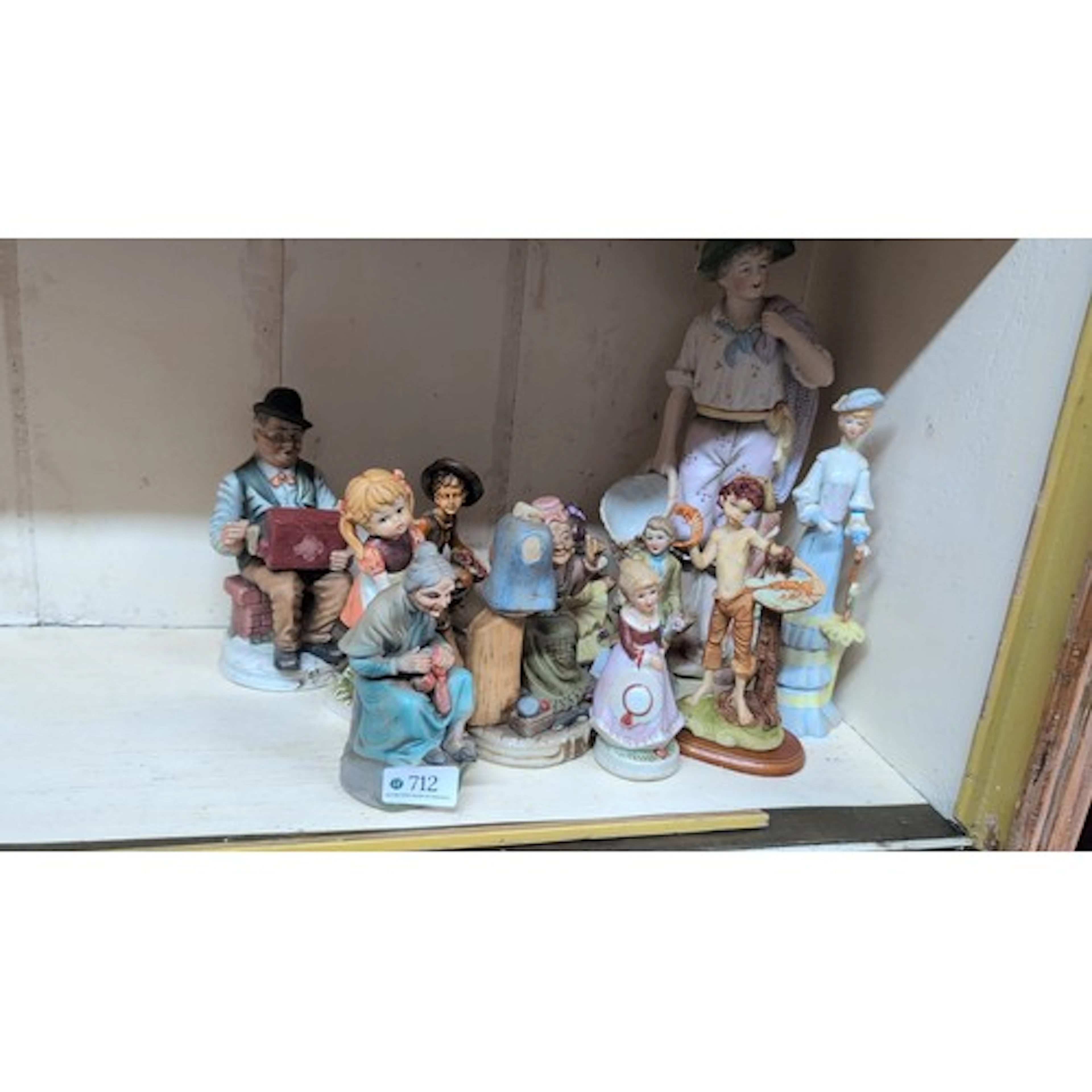 A group of Continental bisque and glazed porcelain figure gr...