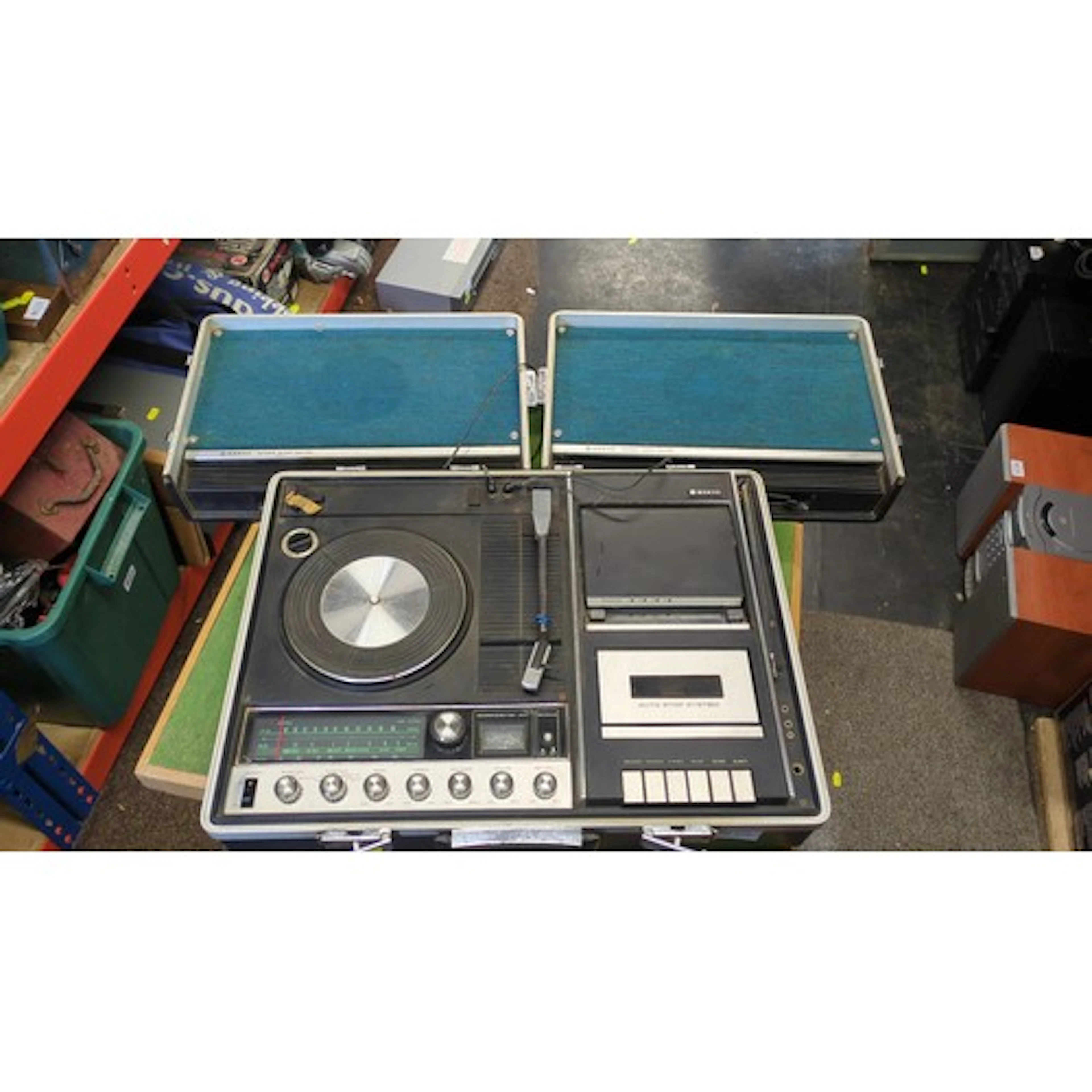 Sanyo stereo music center in portable suitcase format, incor...
