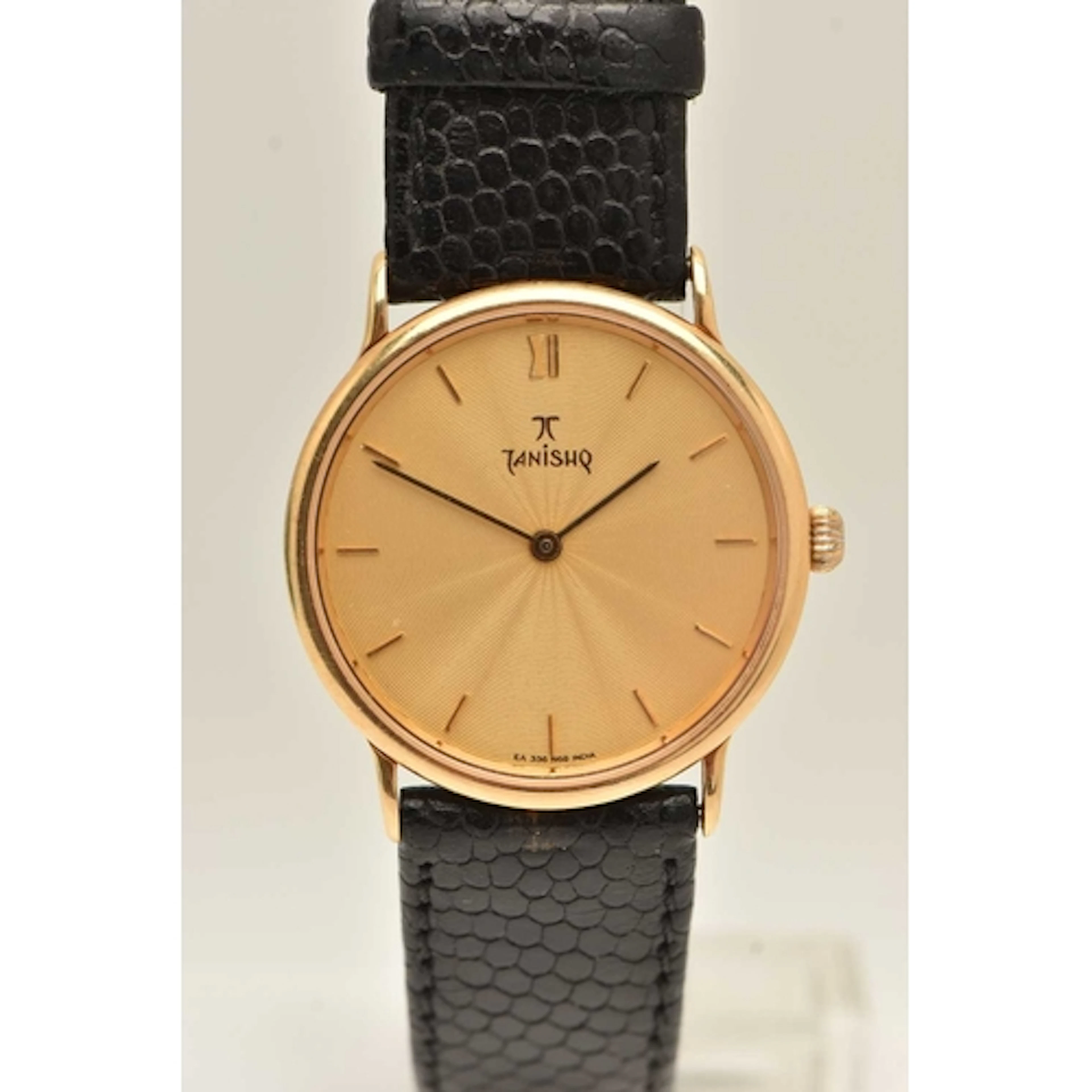 A BOXED GENTS YELLOW METAL 'TITAN TANISHQ' WRISTWATCH, quart...