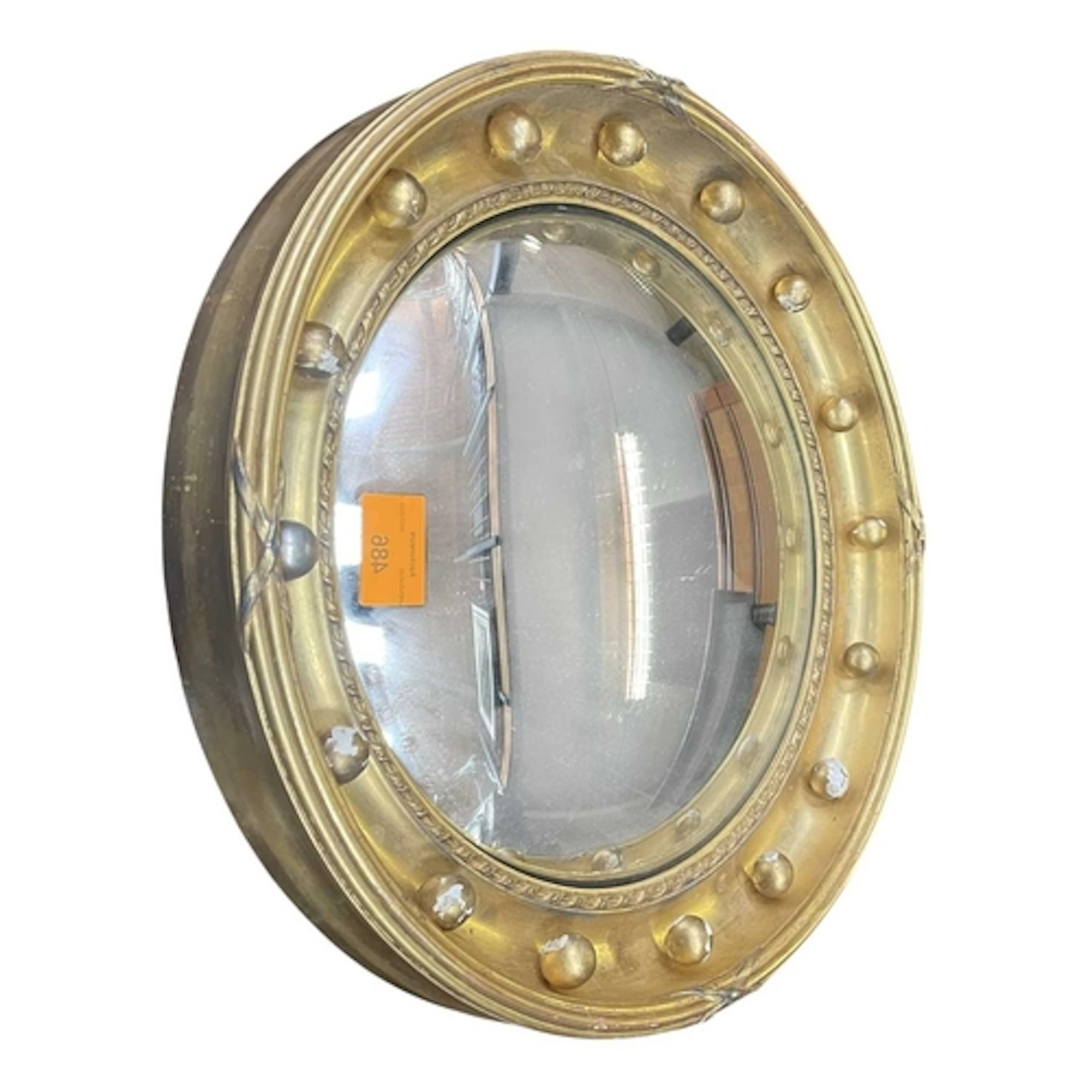 A Regency Revival gilt framed convex wall mirror. The rounde...