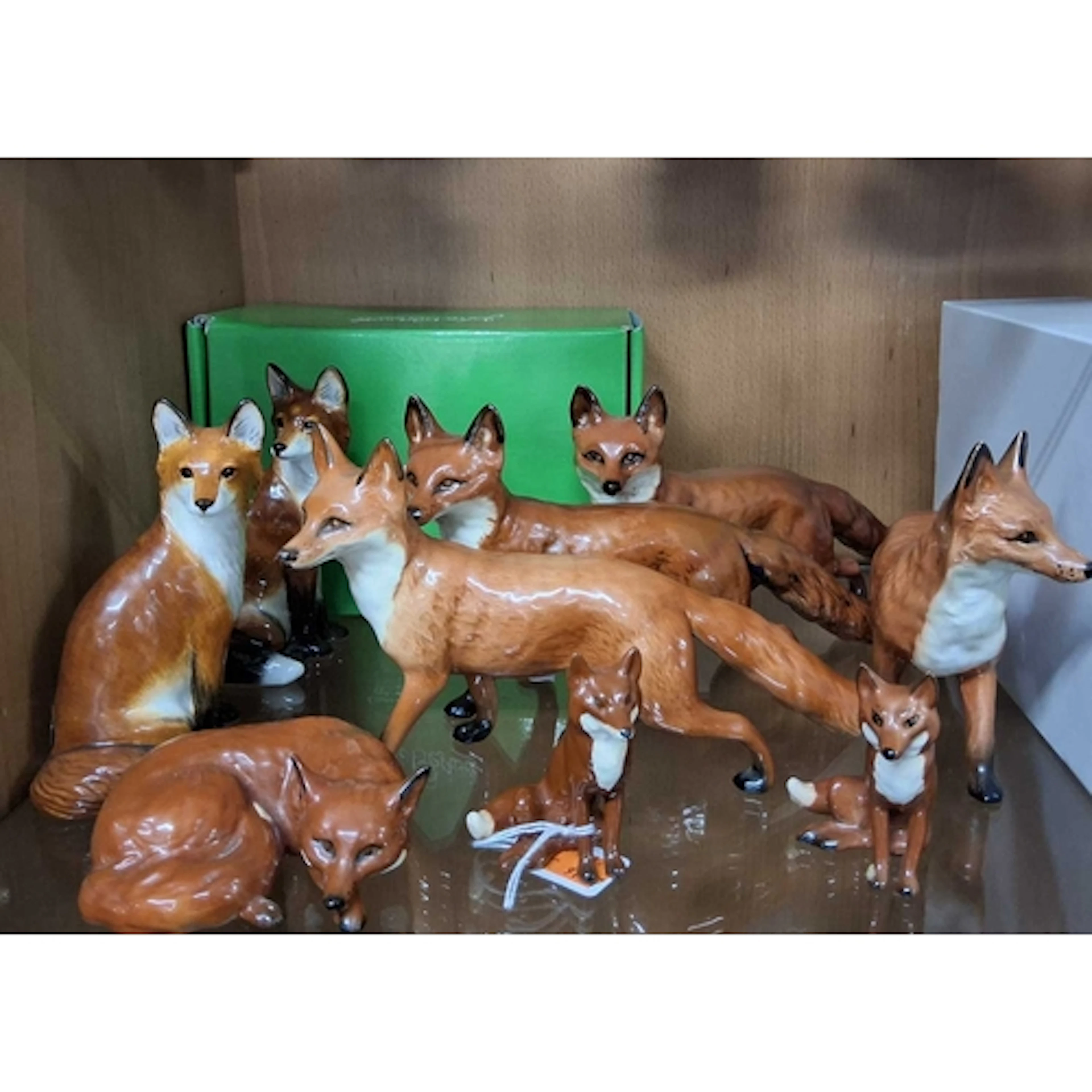 NINE BESWICK/JOHN BESWICK FOX SCULPTURES, comprising two Joh...