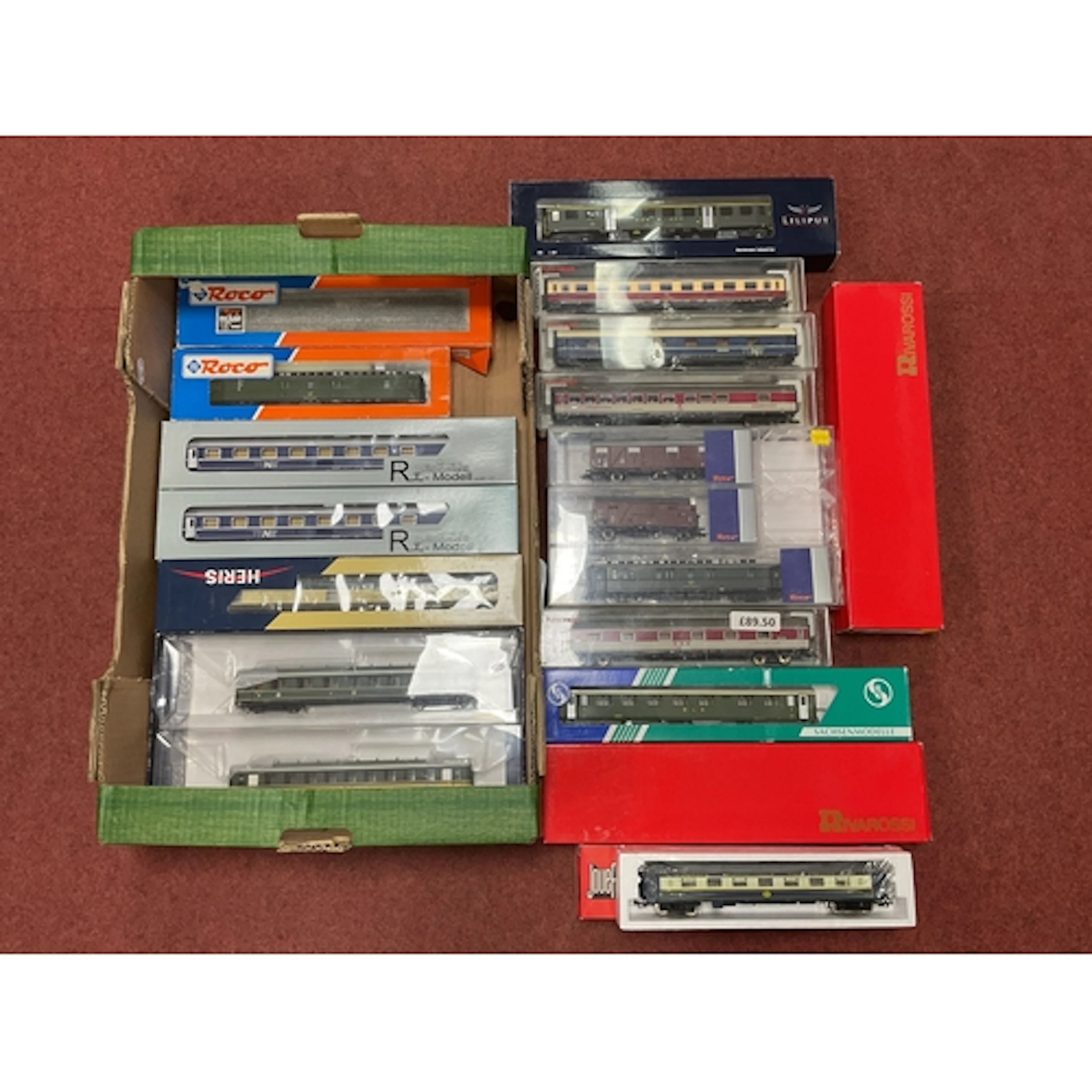 Approximately seventeen boxed HO scale European coaches by R...