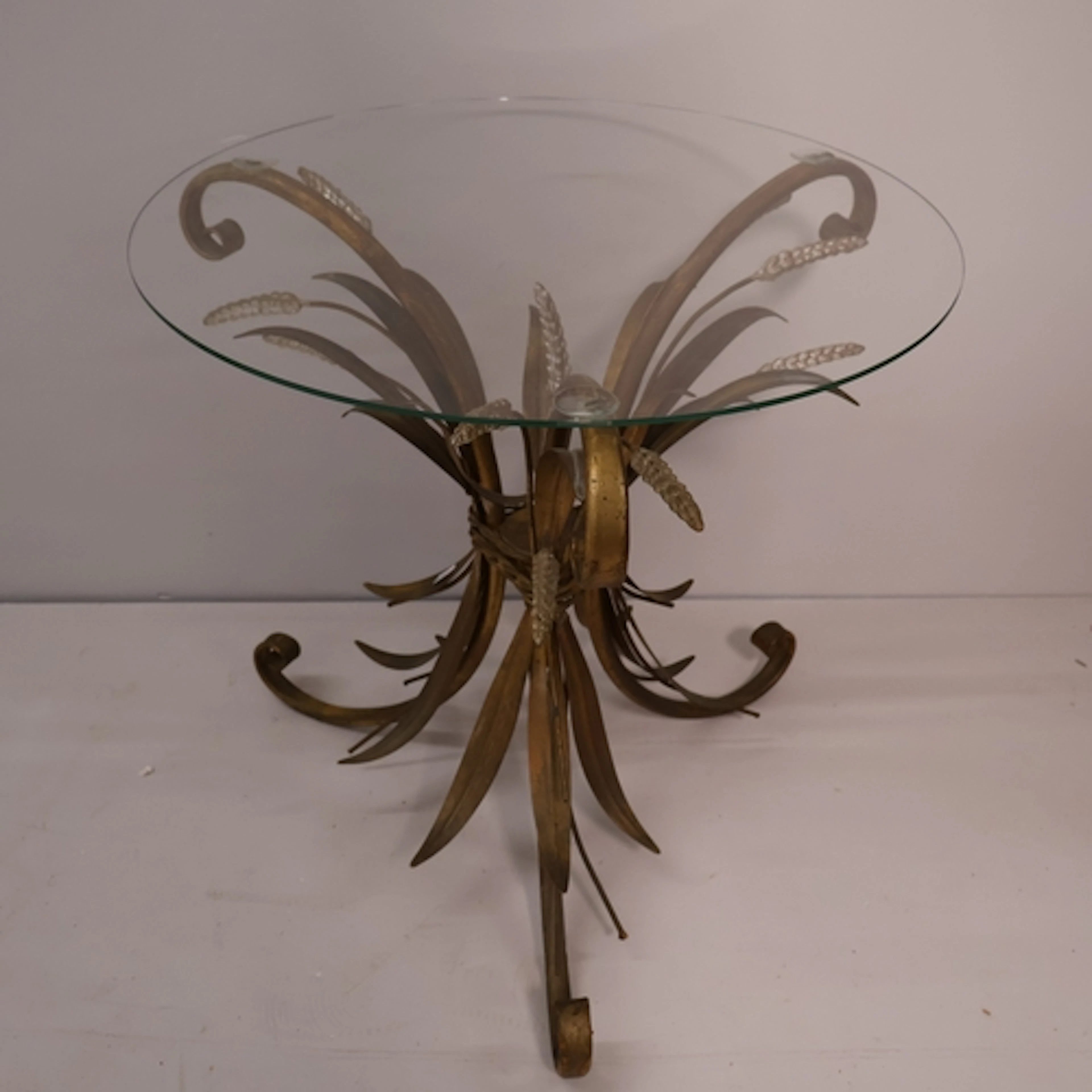 A mid 20th century Hollywood Regency style occasional table,...