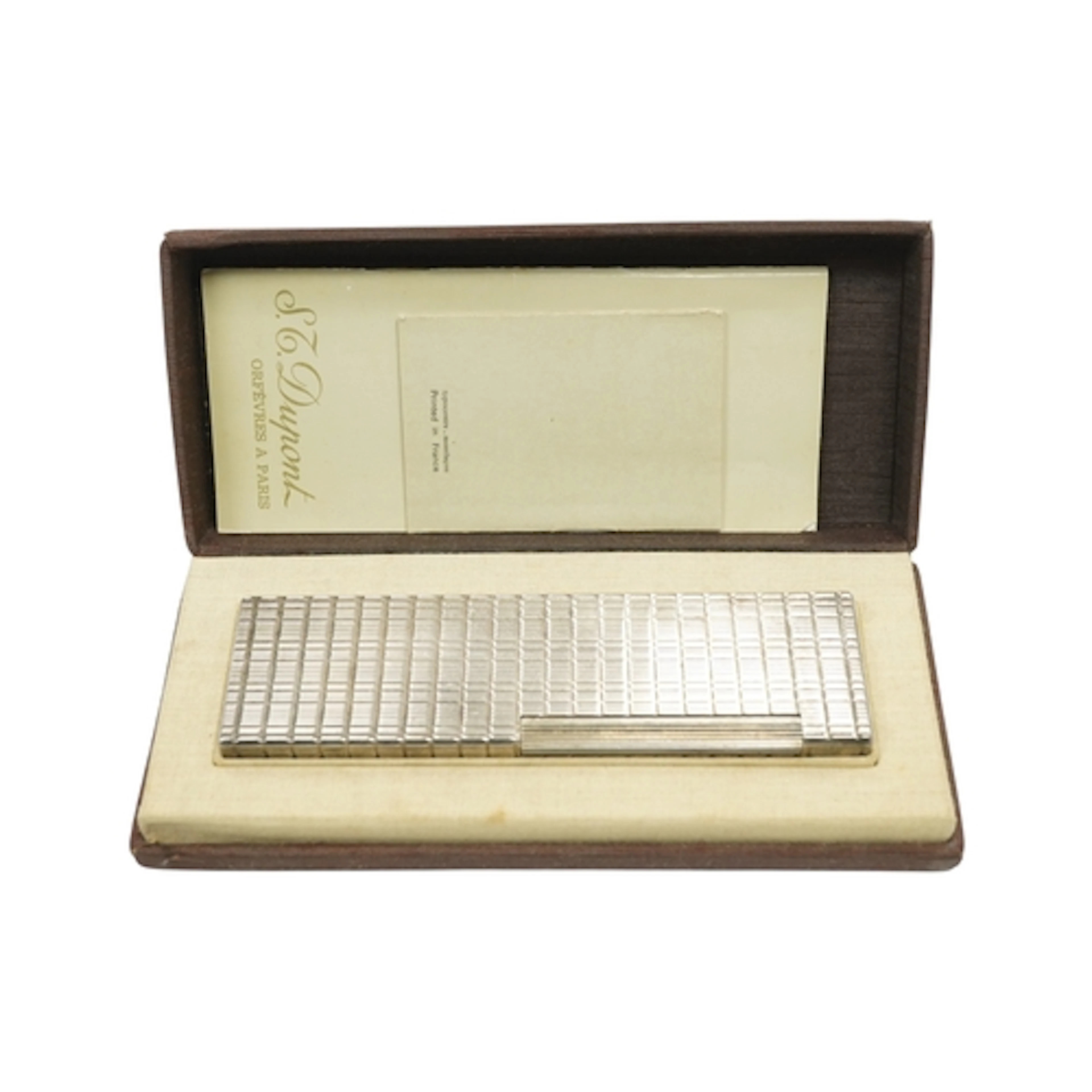 A boxed S T Dupont silver plated briquet table lighter, heig...