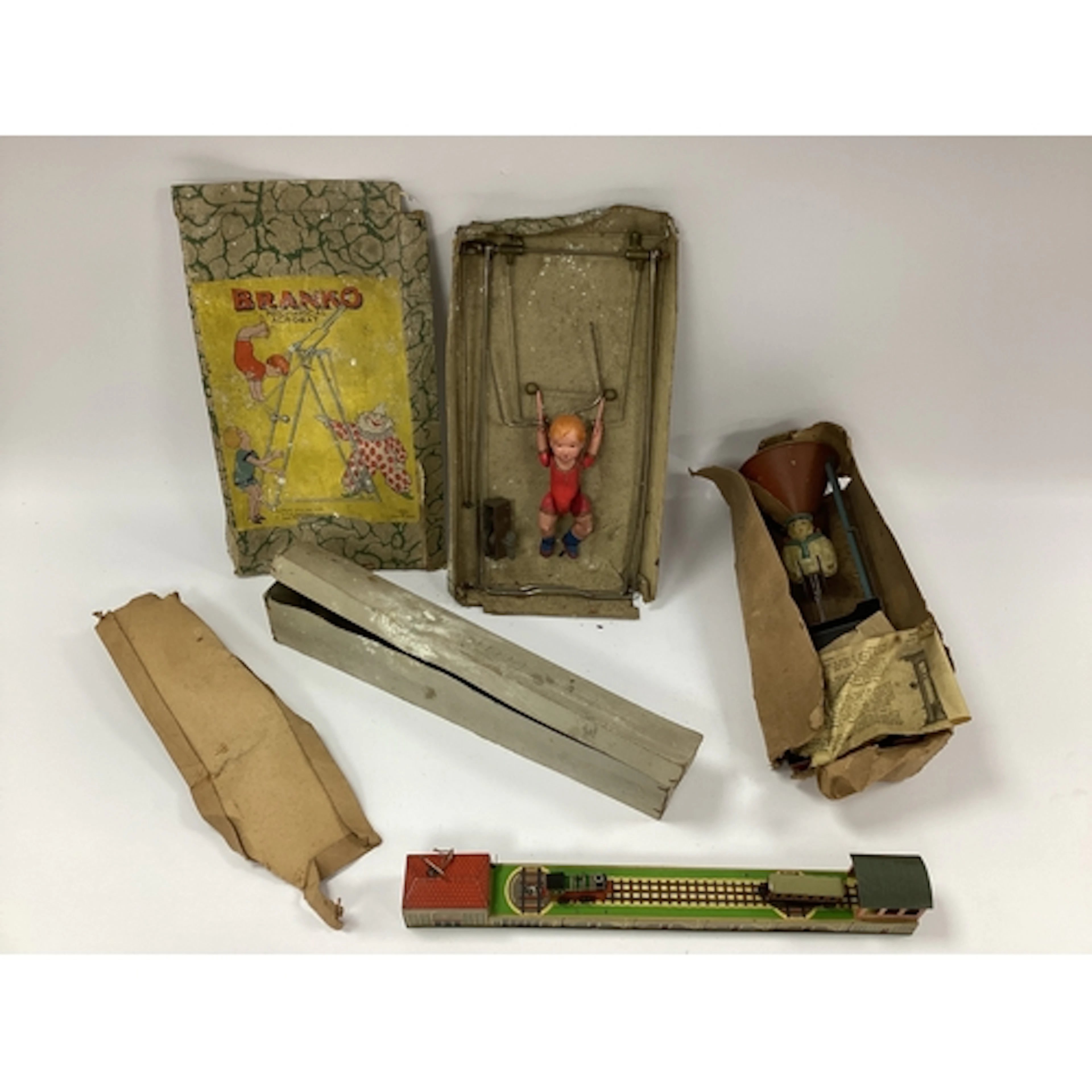 Three Mid XX Century Mechanical toys, including a German San...