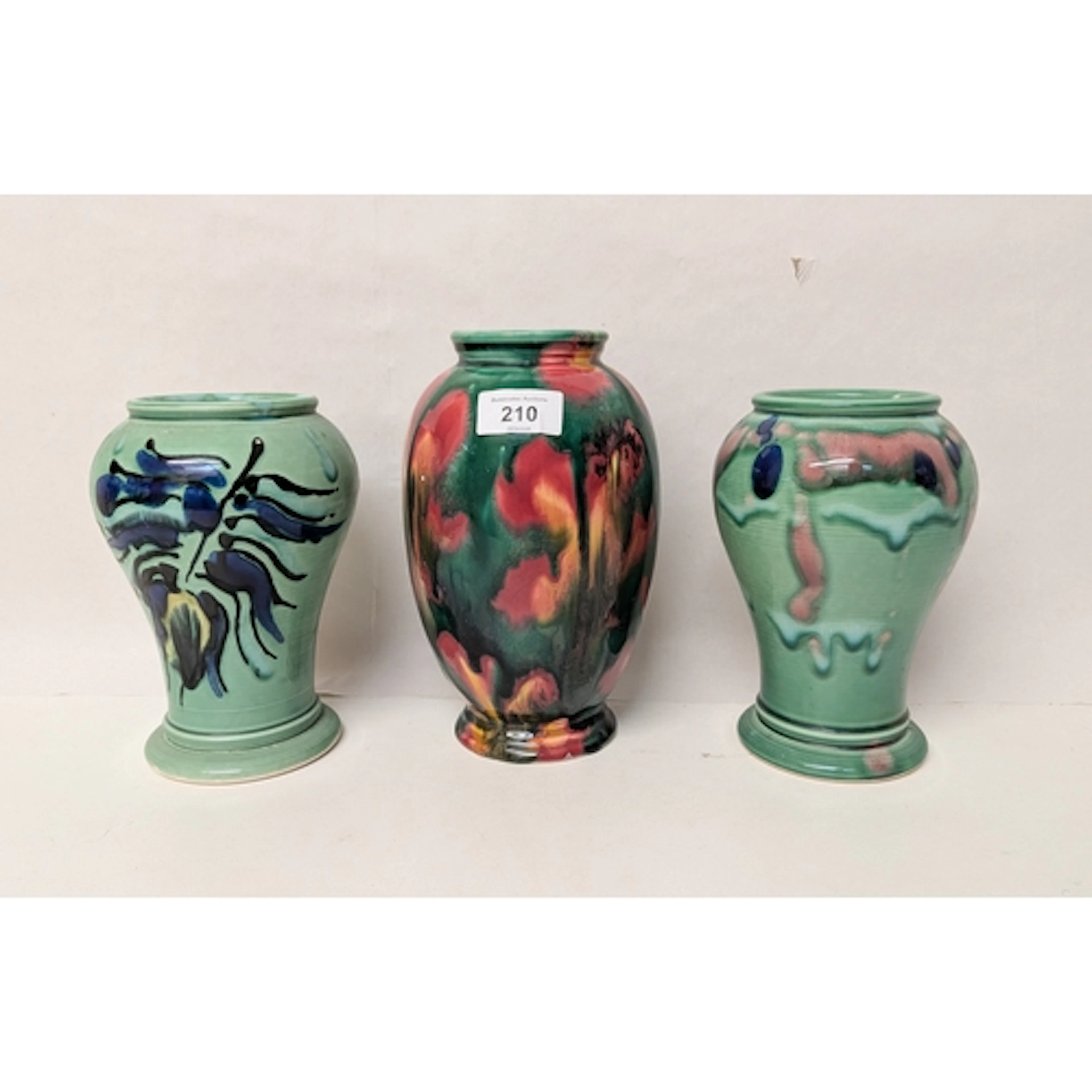 A collection of modern Poole Pottery to include a pair of gr...