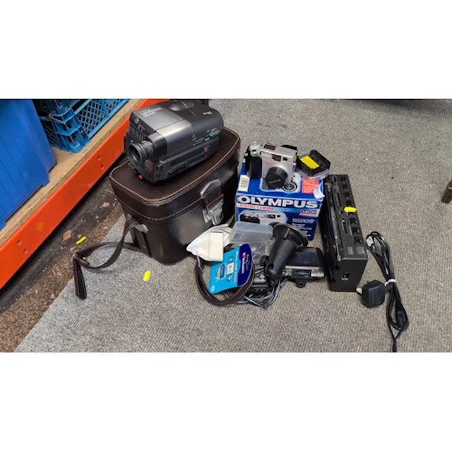 A group of electronics comprising a Sony Hi8 Handycam camcor...