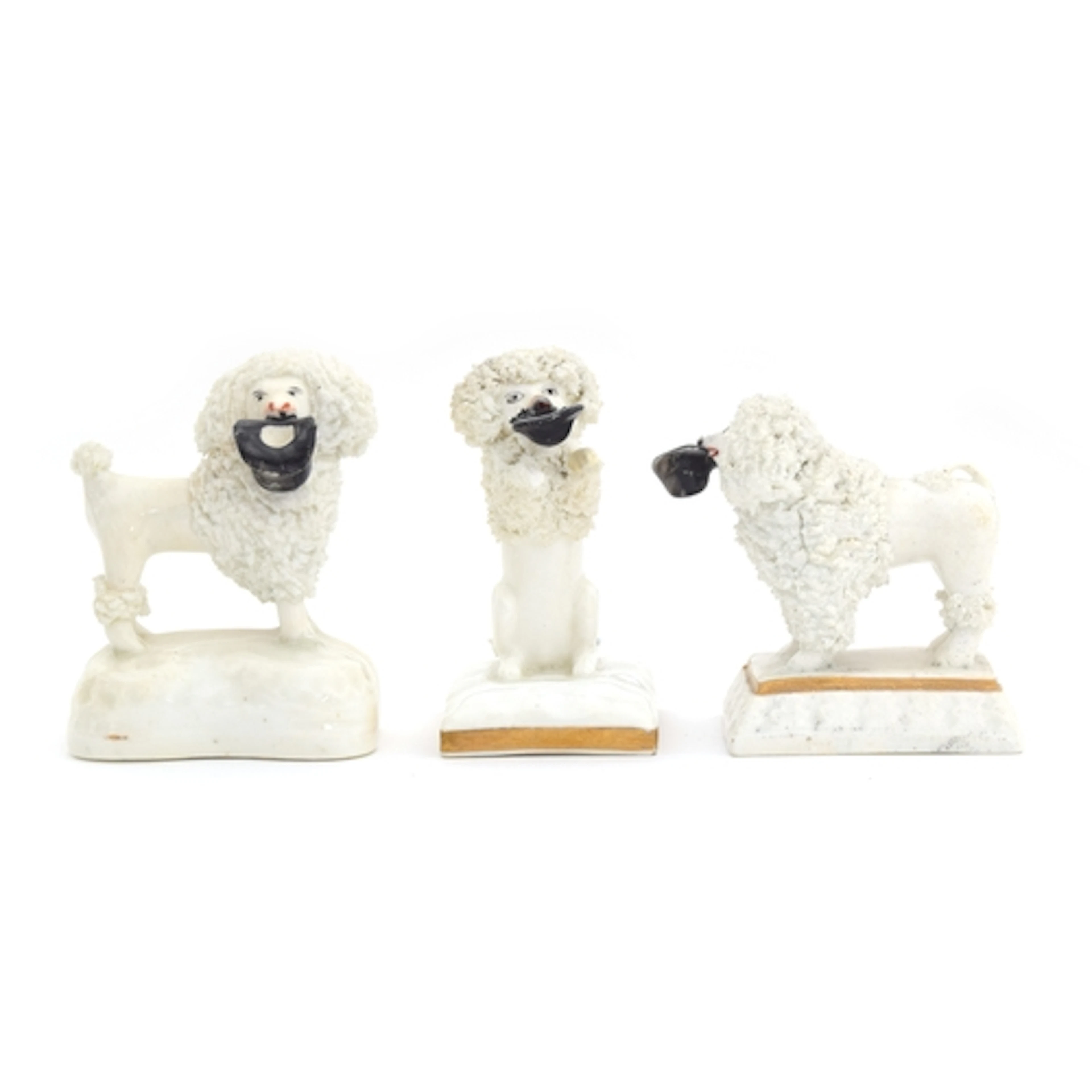 A group of three early 19th century Rockingham porcelain fig...
