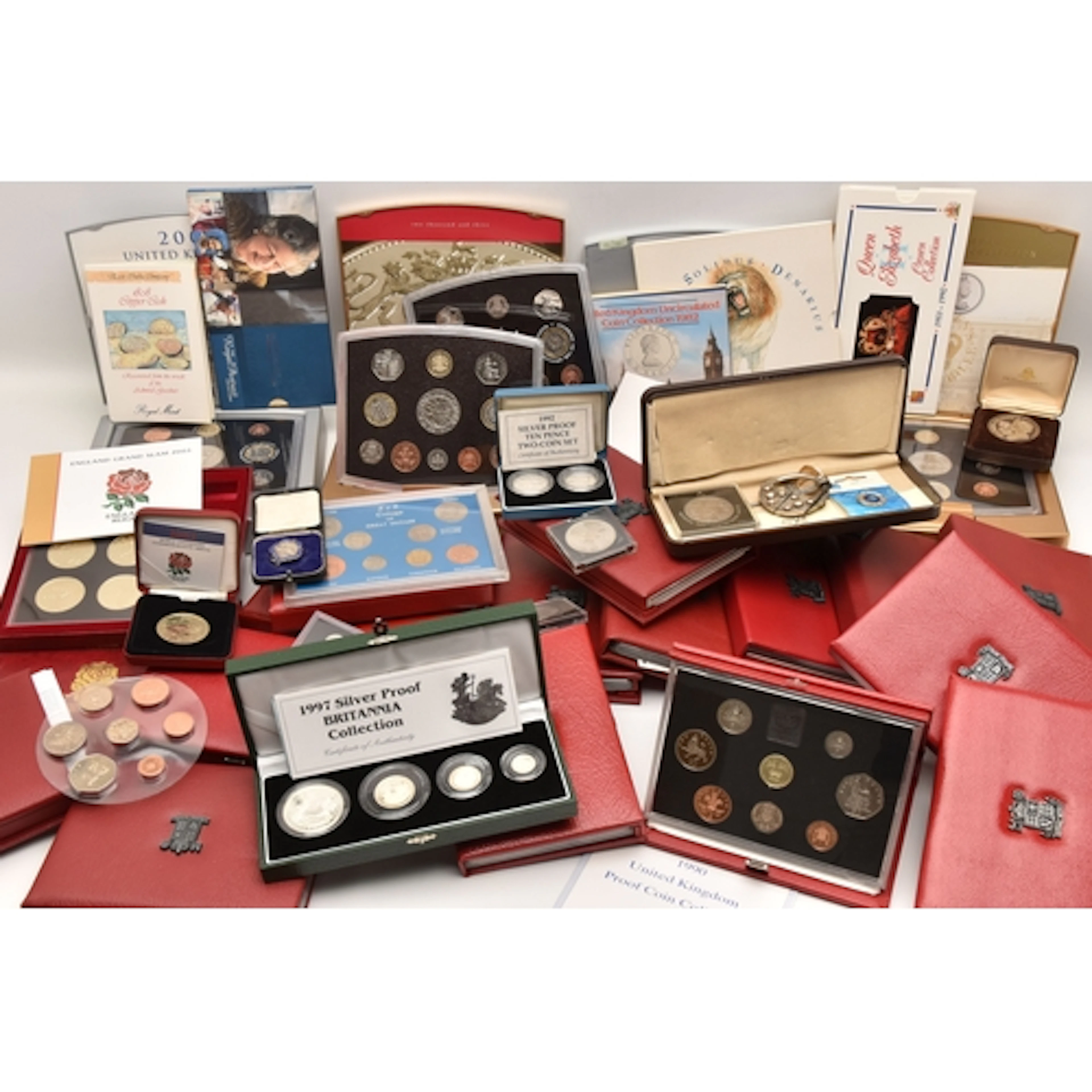 A PLASTIC STORAGE BOX CONTAINING COINS AND COIN SETS TO INCL...