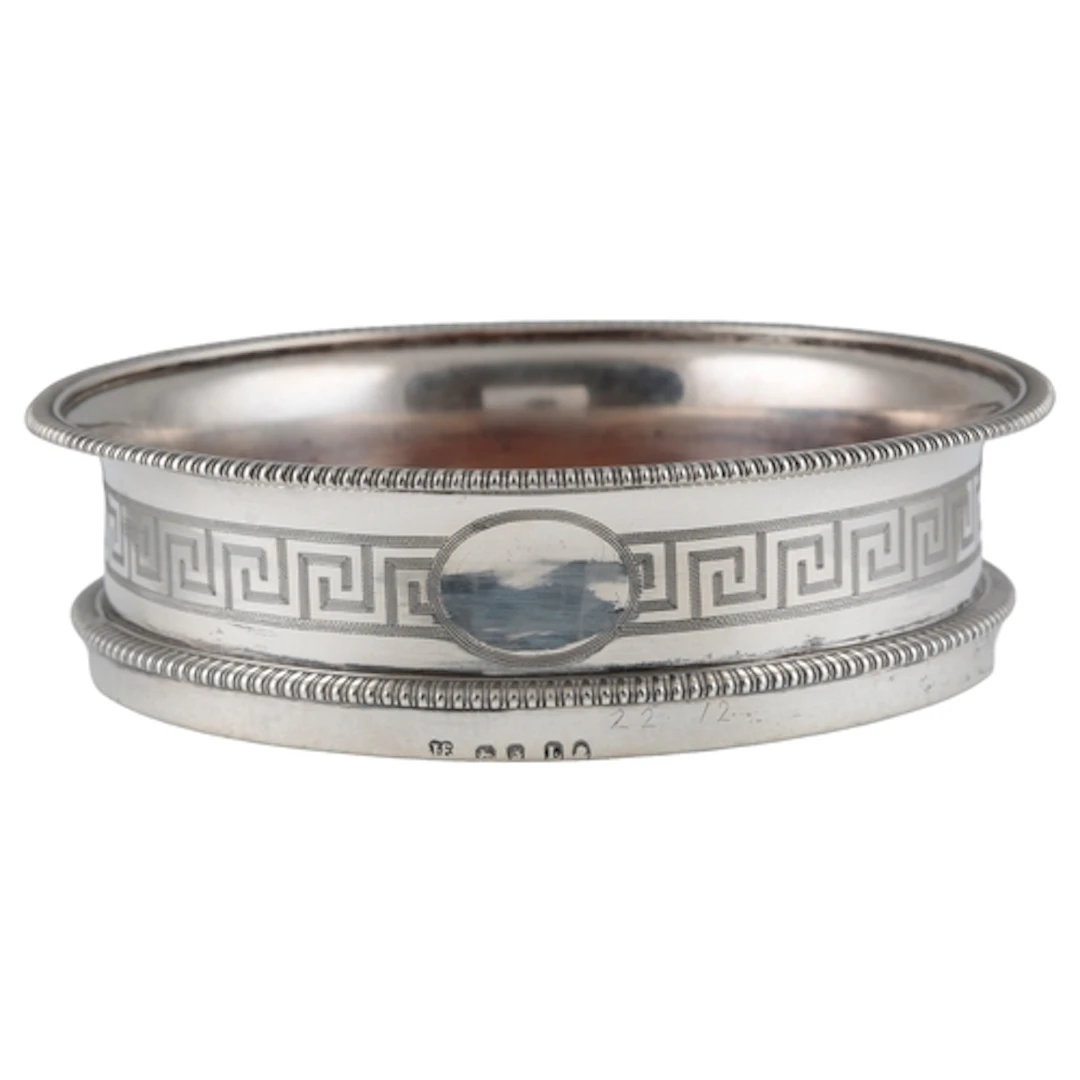 A George III silver mounted wine coaster, by John Emes, with...